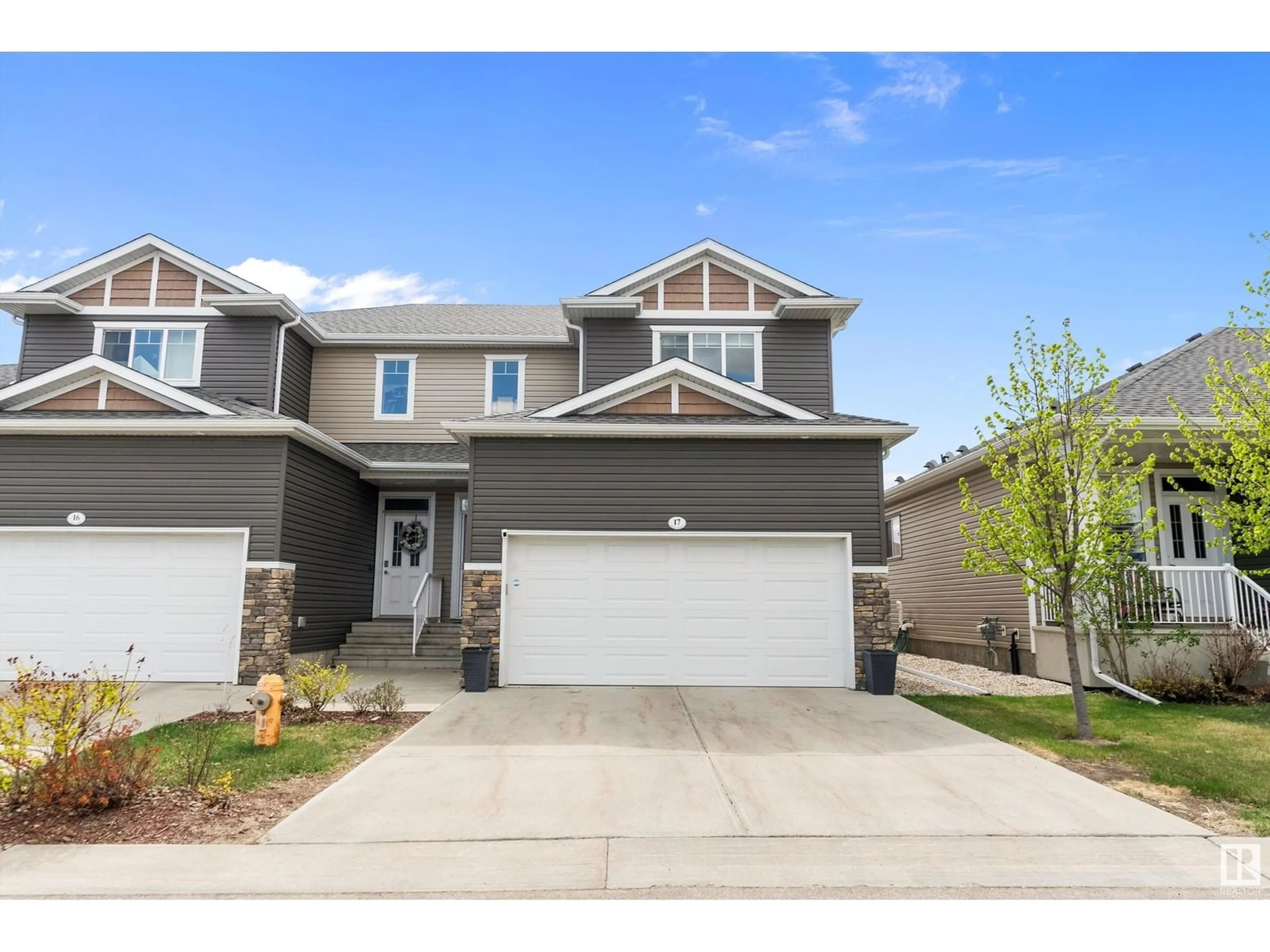 Home with vinyl exterior material, street for 17 - 18230 104A ST NW, Edmonton Alberta T5X0G9