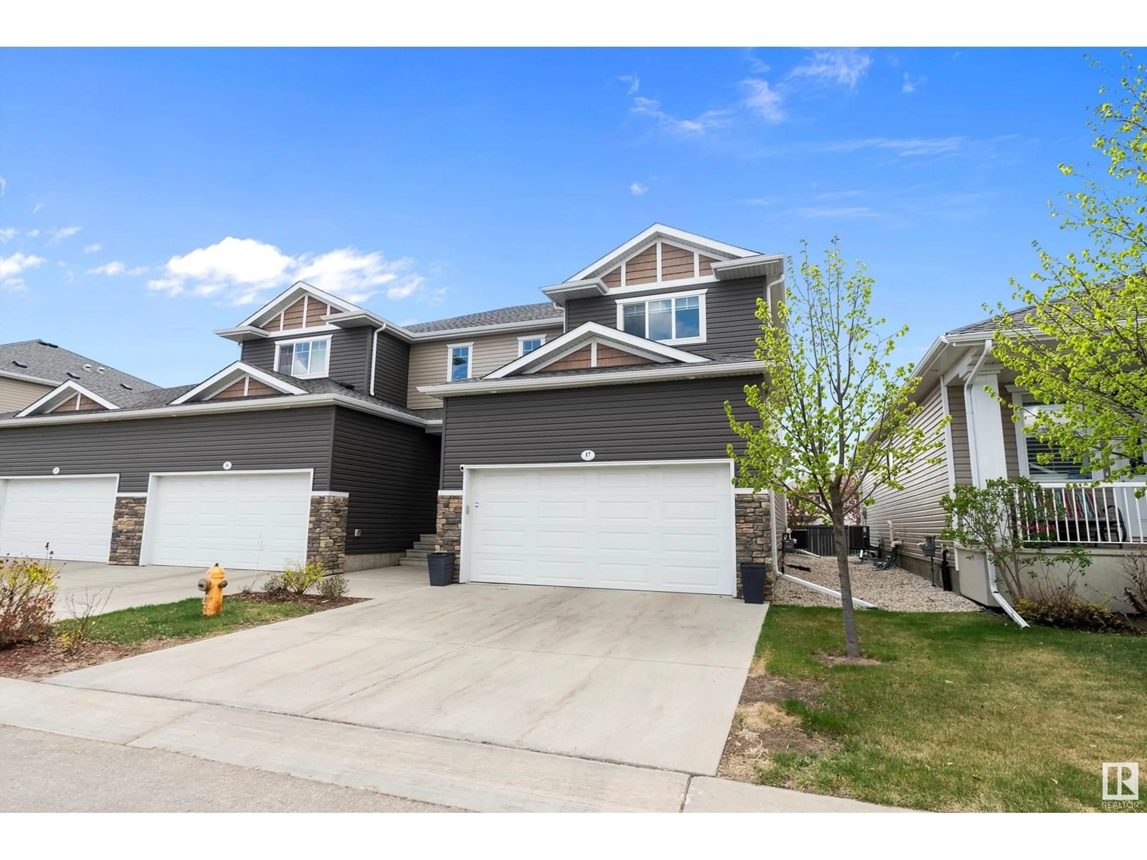 Home with vinyl exterior material, street for 17 - 18230 104A ST NW, Edmonton Alberta T5X0G9