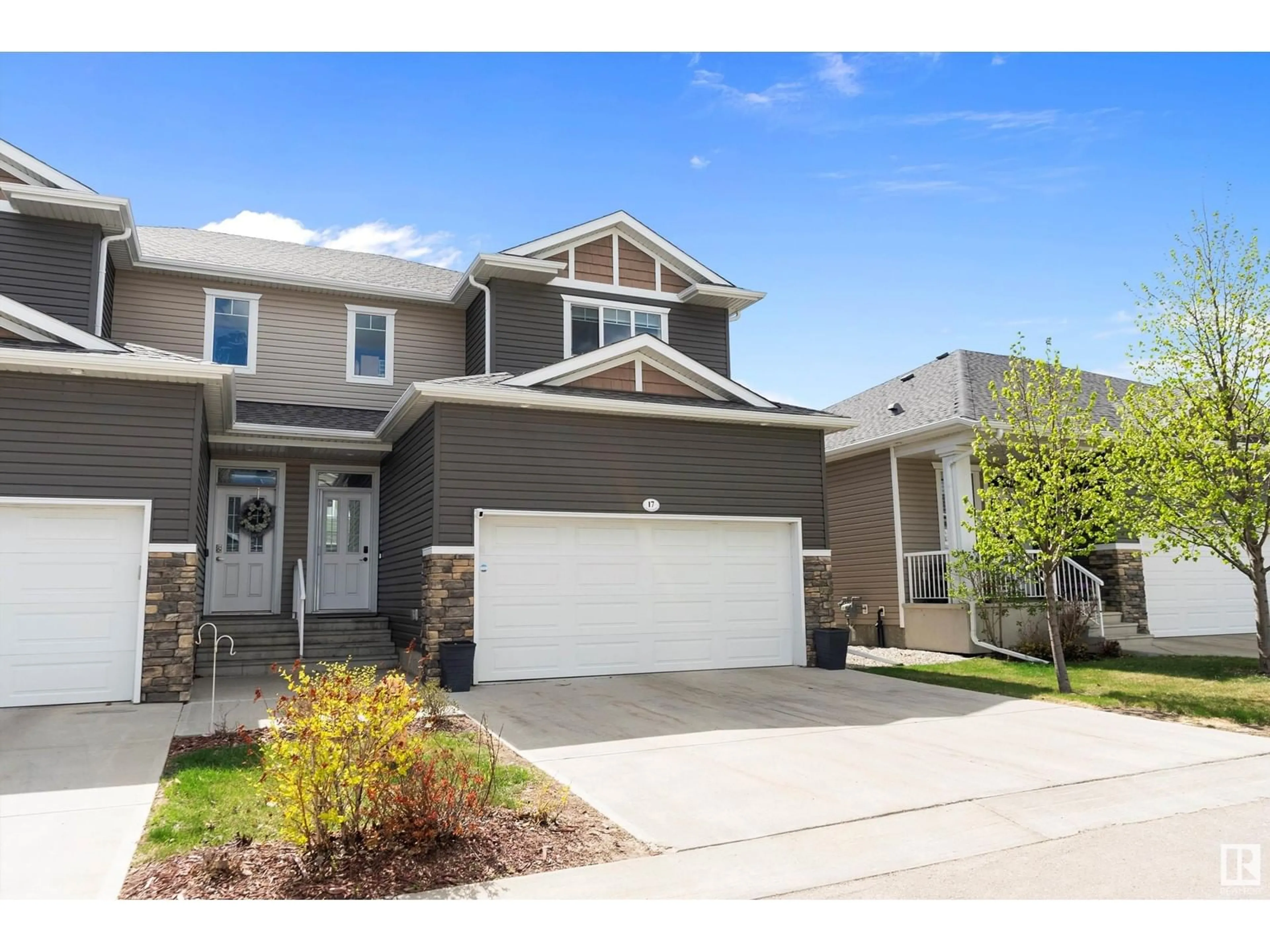 Home with vinyl exterior material, street for 17 - 18230 104A ST NW, Edmonton Alberta T5X0G9