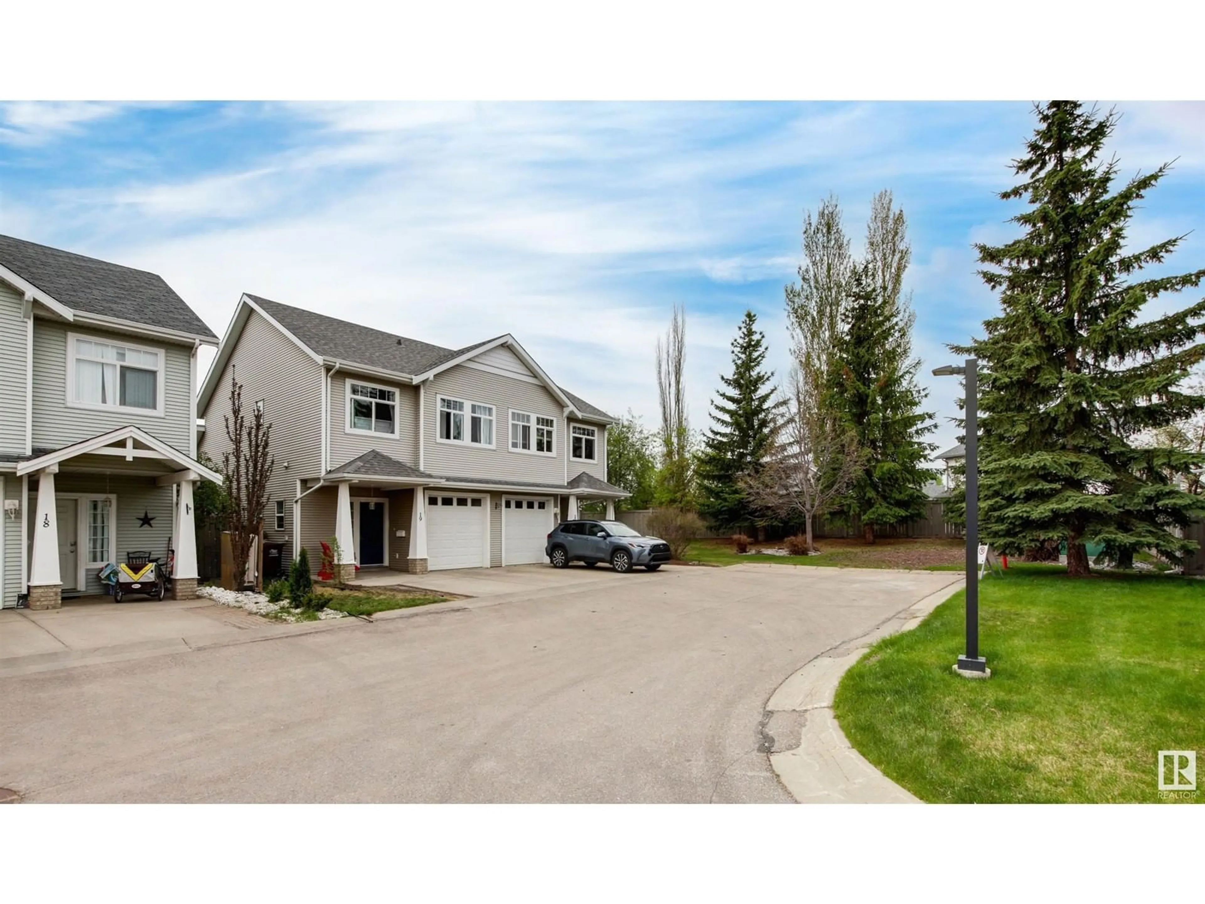 A pic from outside/outdoor area/front of a property/back of a property/a pic from drone, street for 200 - 19 ERIN RIDGE DR, St. Albert Alberta T8N7E2