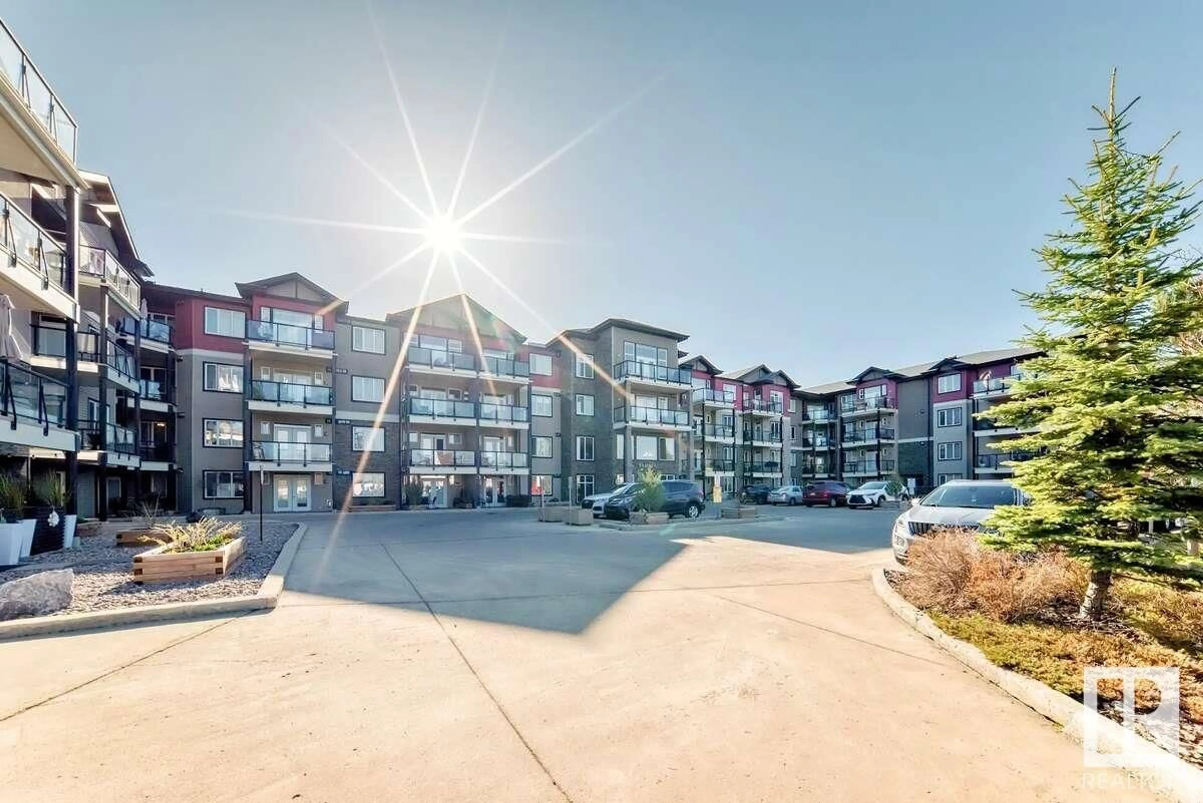 A pic from outside/outdoor area/front of a property/back of a property/a pic from drone, unknown for #208 - 12408 15 AV, Edmonton Alberta T6W1X2