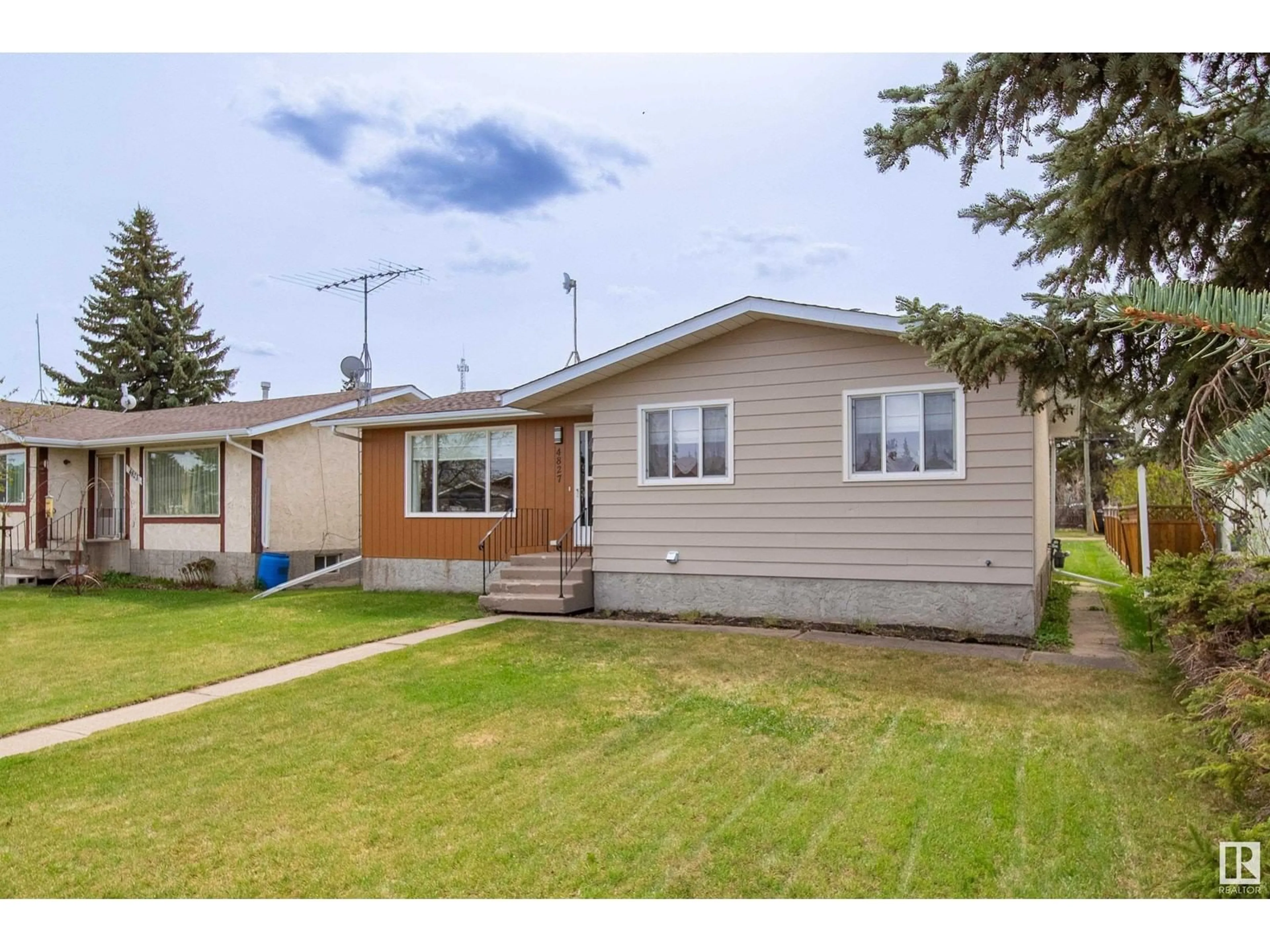 Home with vinyl exterior material, street for 4827 56 AVE, Tofield Alberta T0B4J0