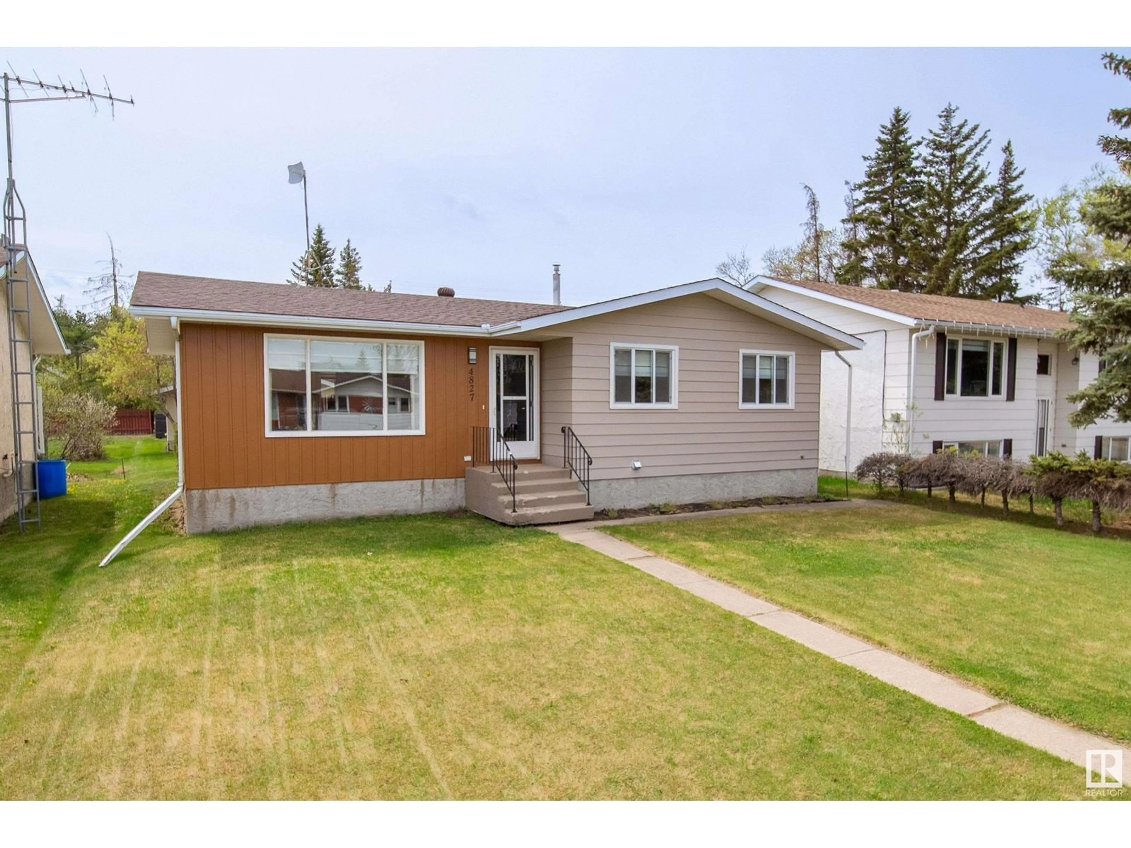 Home with vinyl exterior material, street for 4827 56 AVE, Tofield Alberta T0B4J0