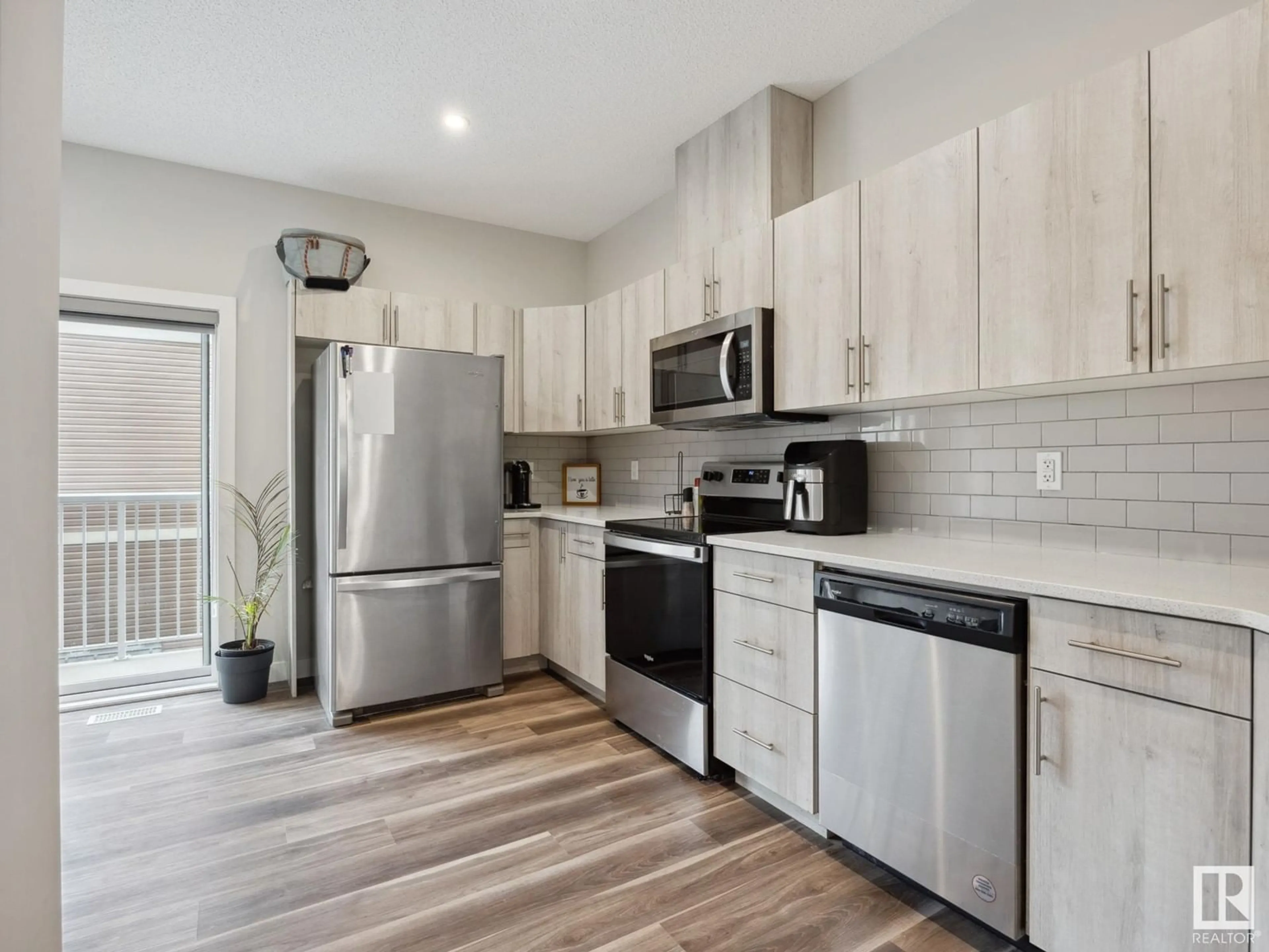 Open concept kitchen, unknown for 21 - 1051 GRAYDON HILL BV, Edmonton Alberta T6W3C8