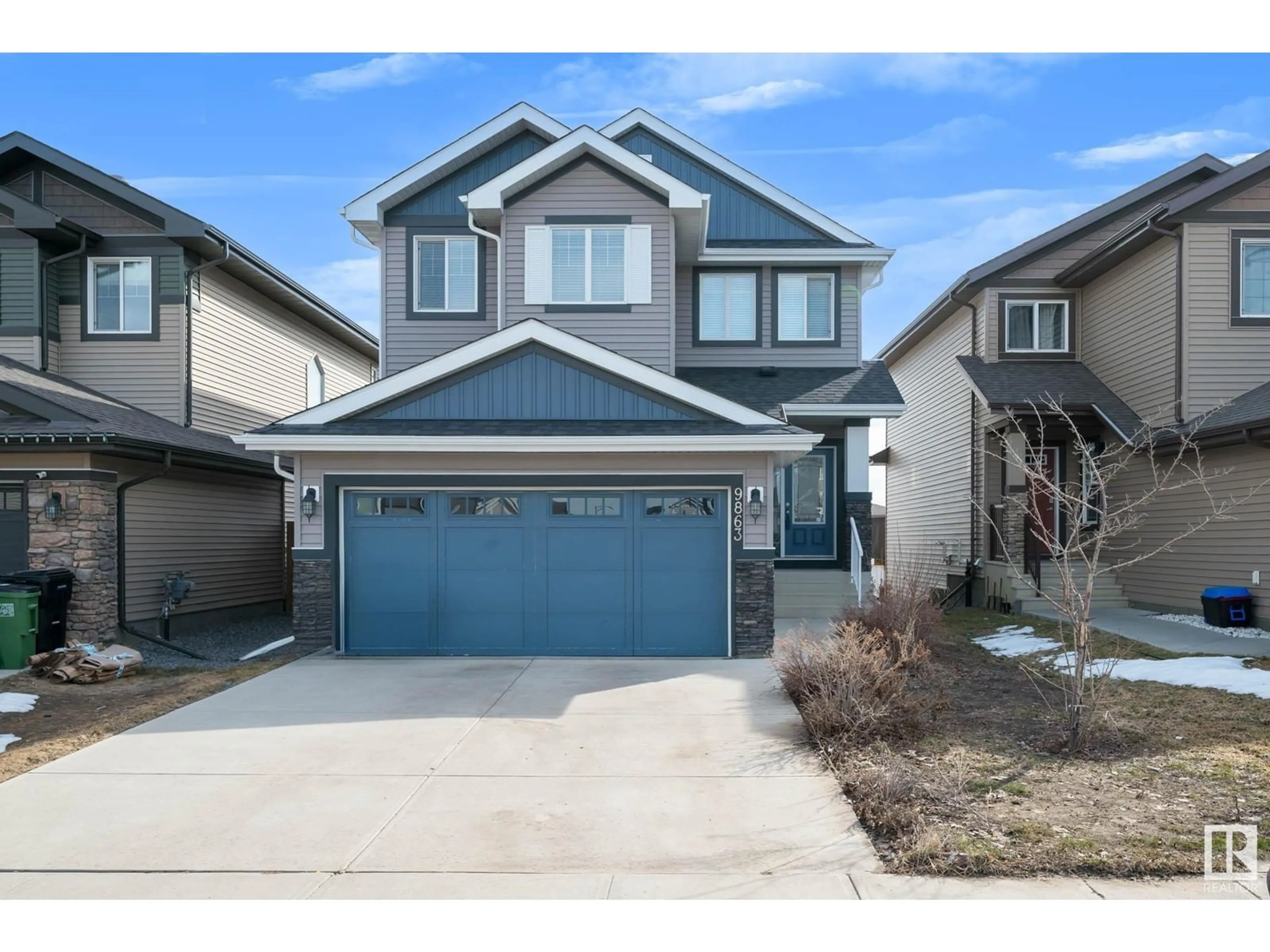 Home with vinyl exterior material, street for NW - 9863 222 ST, Edmonton Alberta T5T7J1
