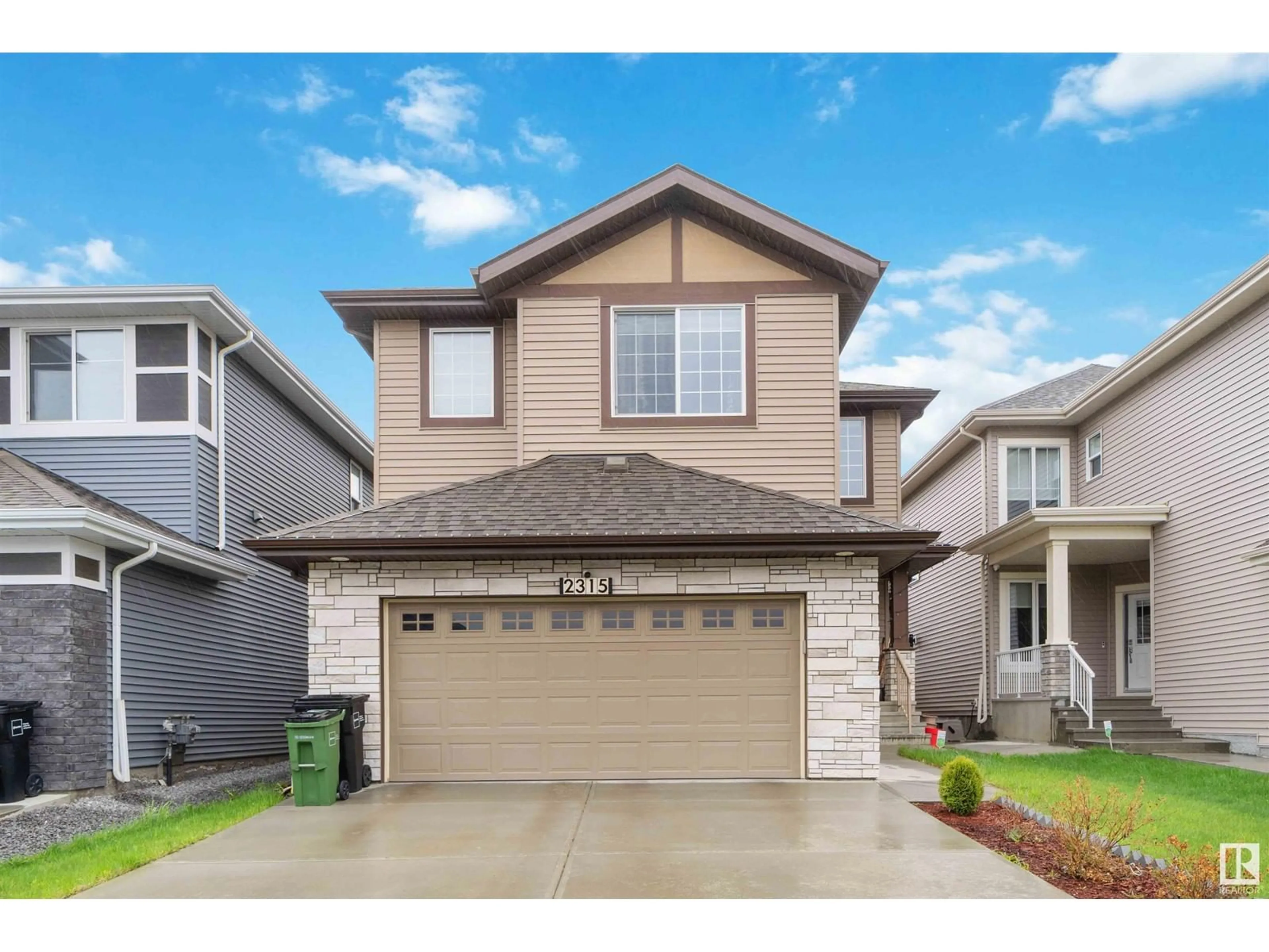 Home with vinyl exterior material, street for 2315 54 STREET, Edmonton Alberta T6X2P1