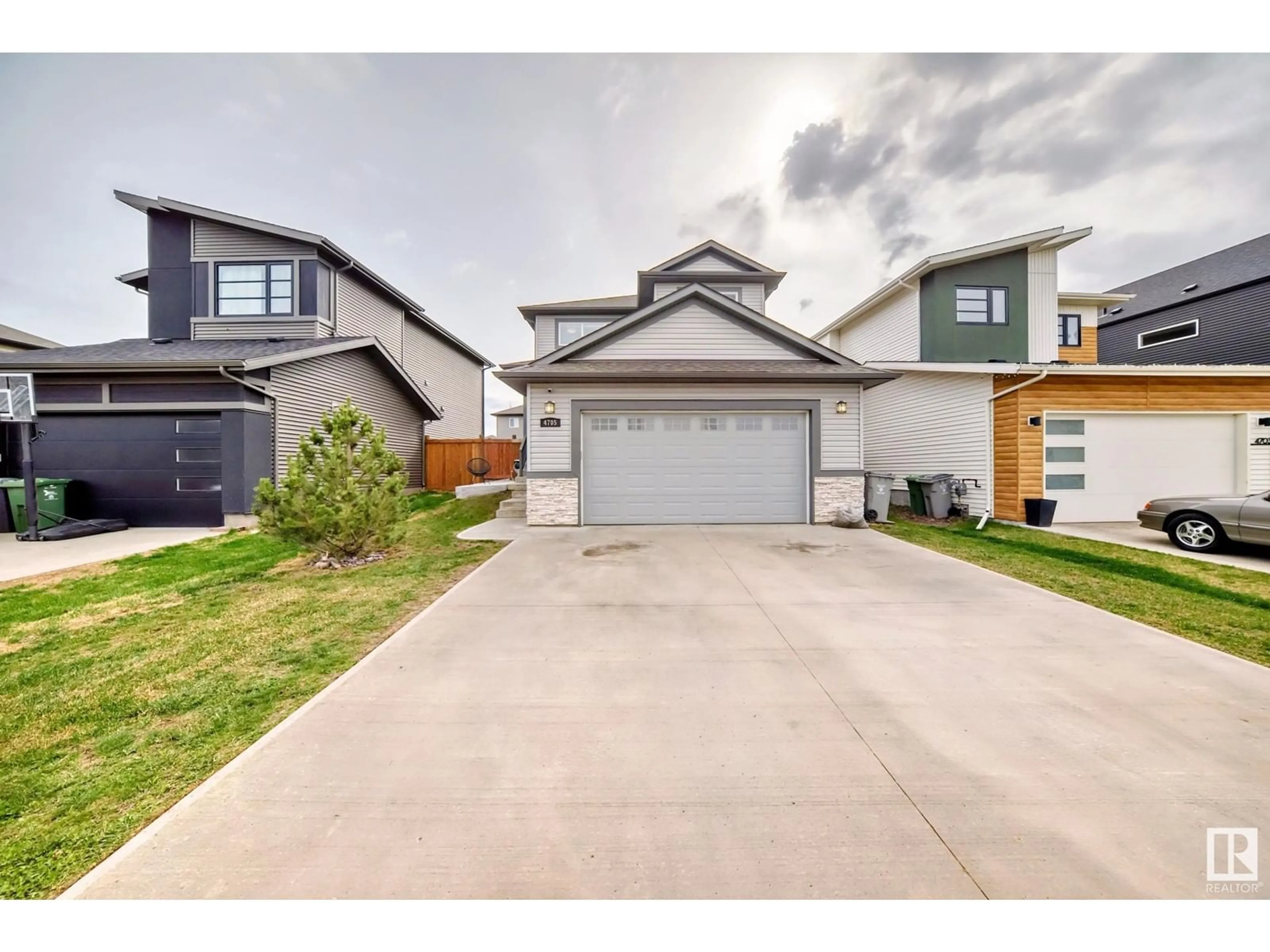 A pic from outside/outdoor area/front of a property/back of a property/a pic from drone, street for 4705 66 ST, Beaumont Alberta T4X1Y5