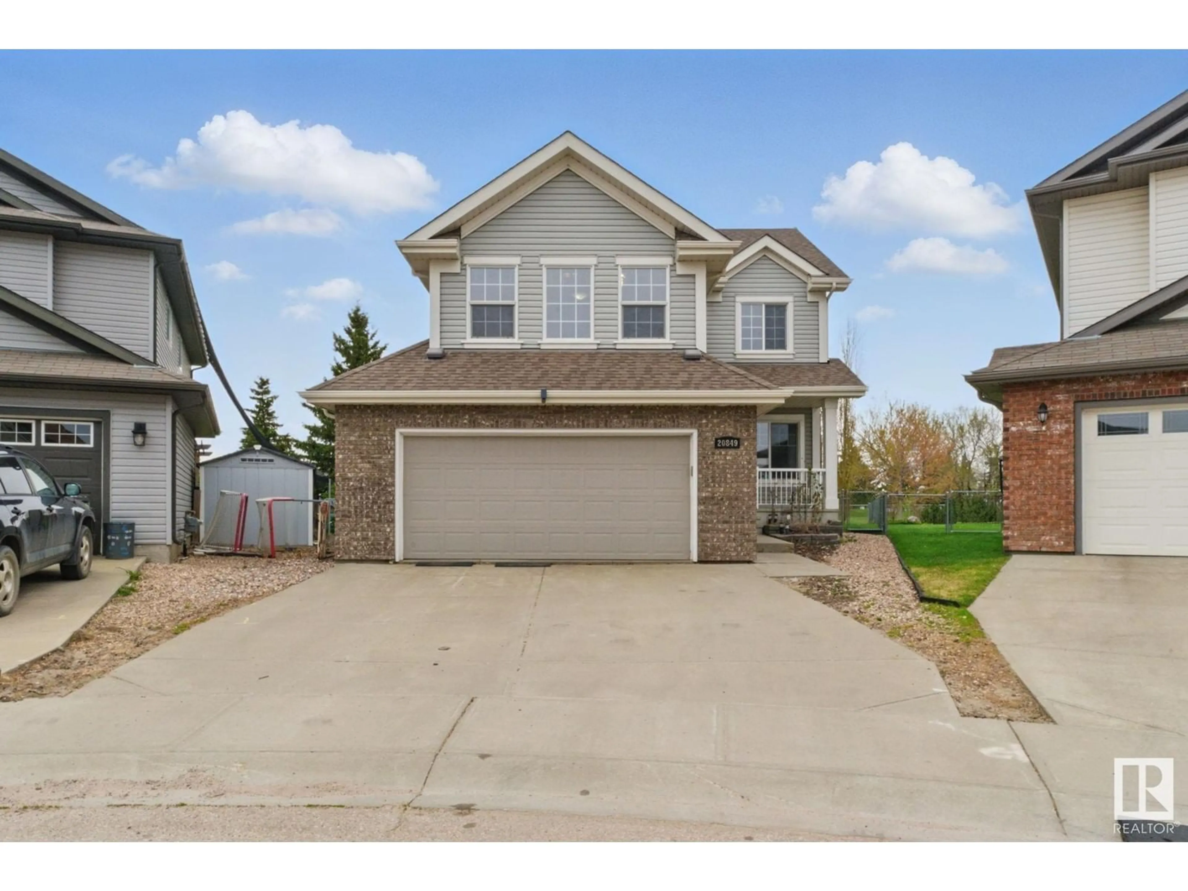 Home with vinyl exterior material, street for 20849 92A AV, Edmonton Alberta T5T3Z1