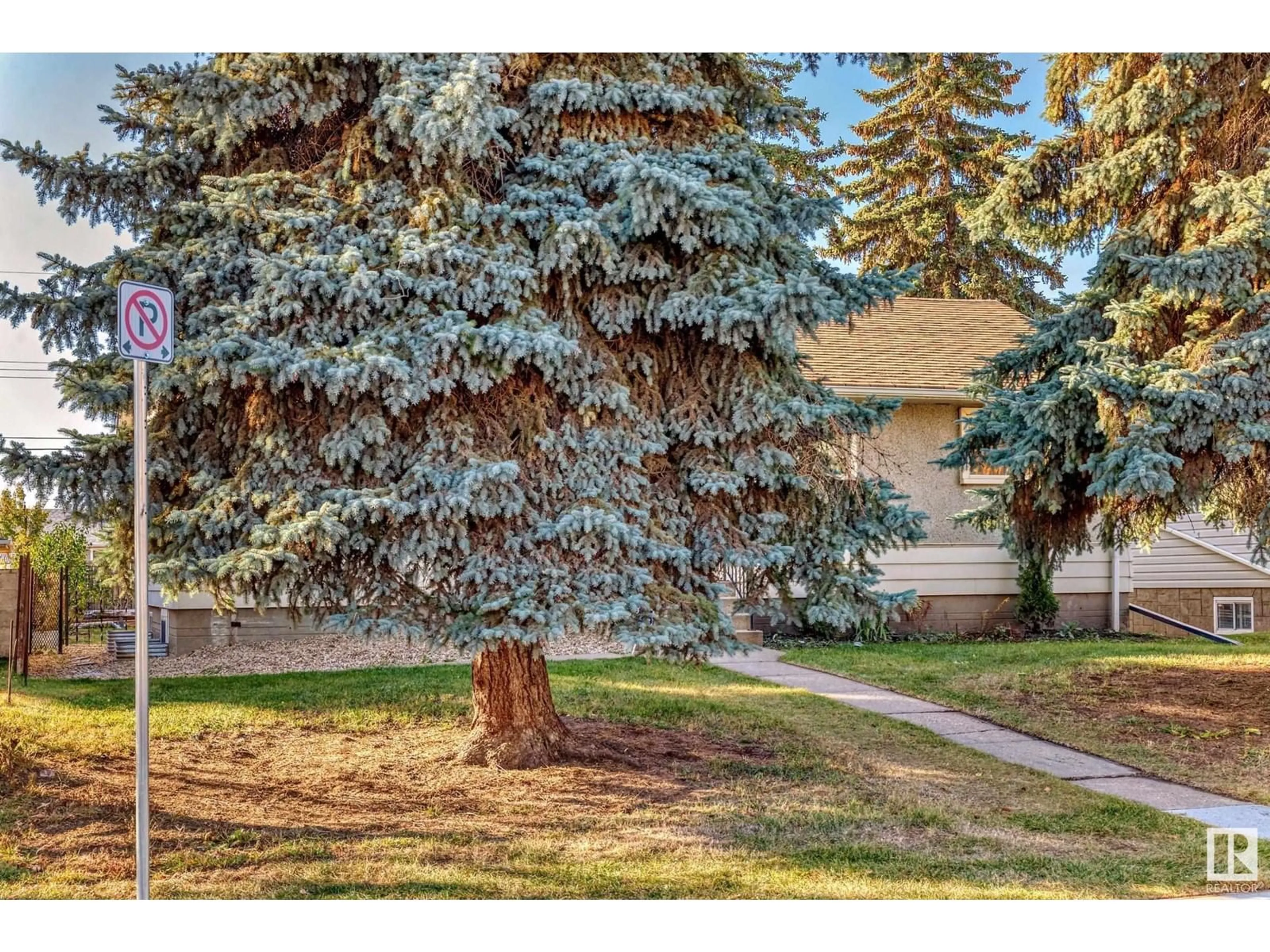 Home with vinyl exterior material, street for NW - 13124 83 ST, Edmonton Alberta T5E2W6