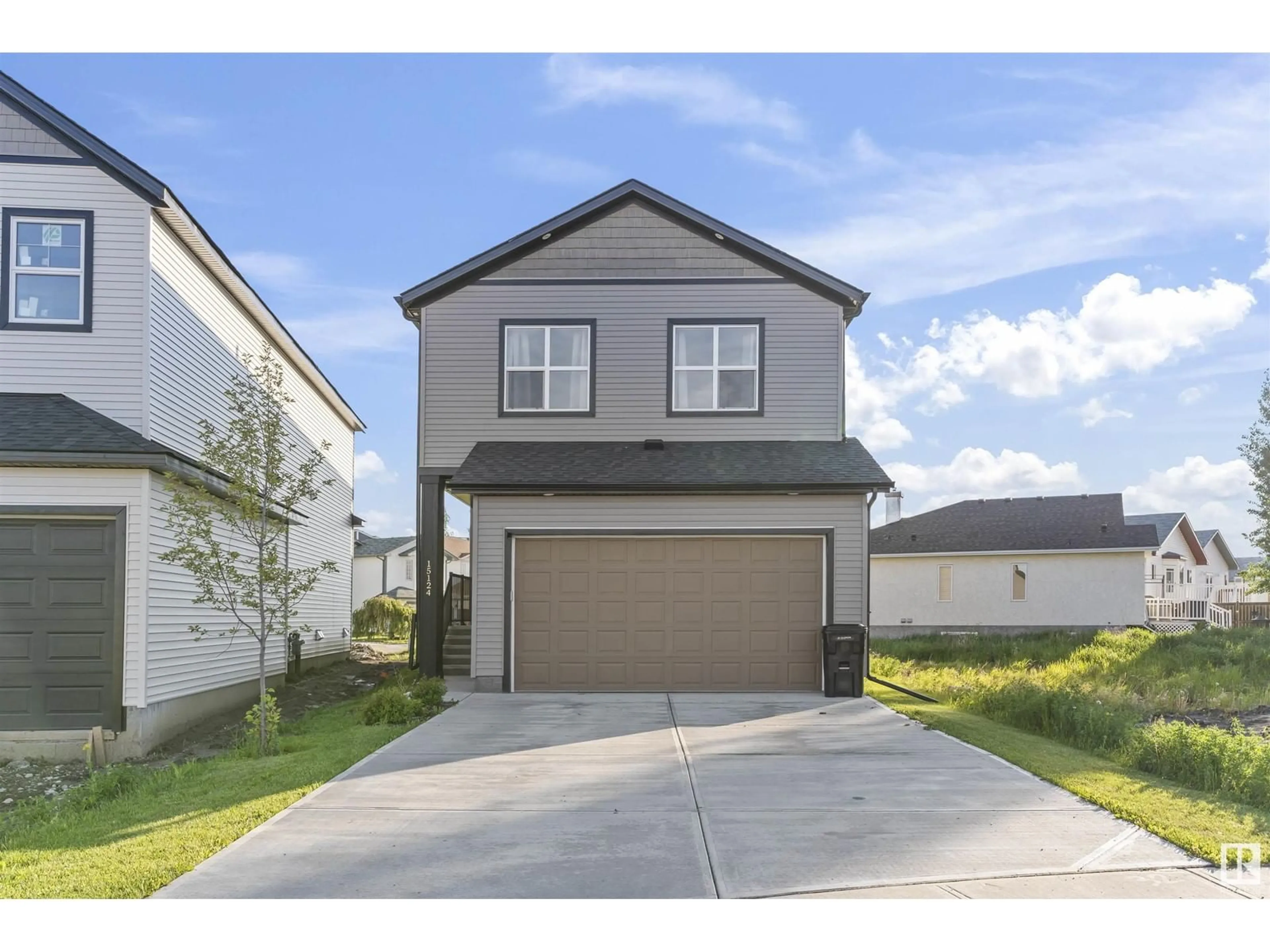 Home with vinyl exterior material, street for NW - 15124 28 ST, Edmonton Alberta T5Y3Y7