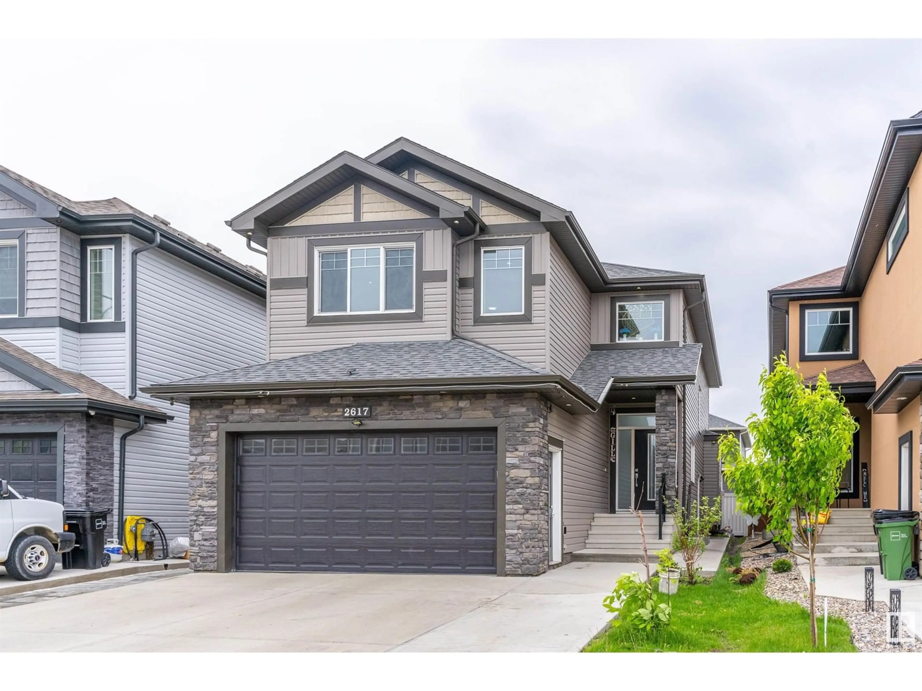 Home with vinyl exterior material, street for 2617 21A AV, Edmonton Alberta T6T0Y5