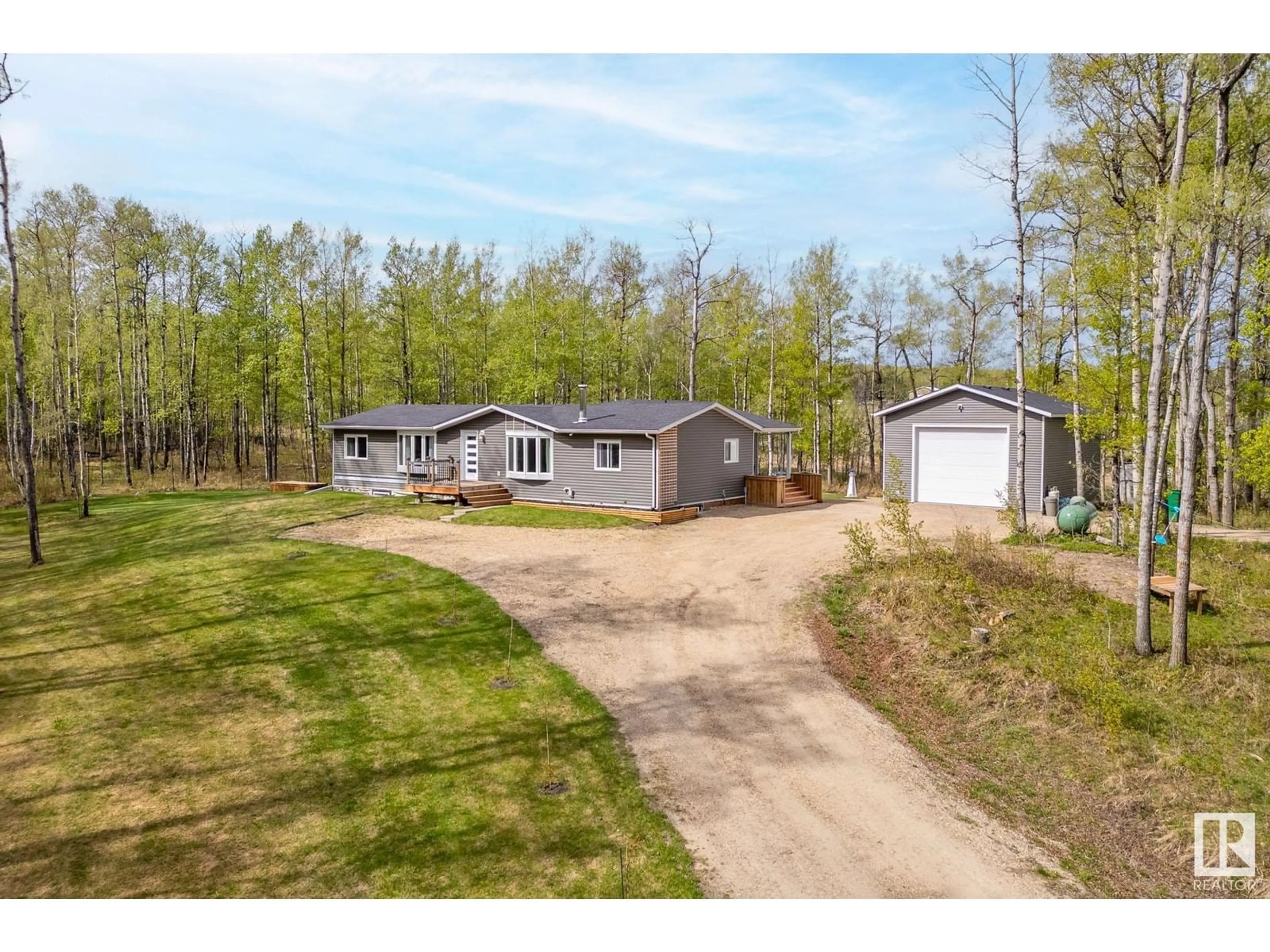 A pic from outside/outdoor area/front of a property/back of a property/a pic from drone, street for 275035 HWY 616, Rural Wetaskiwin County Alberta T0C1Z0