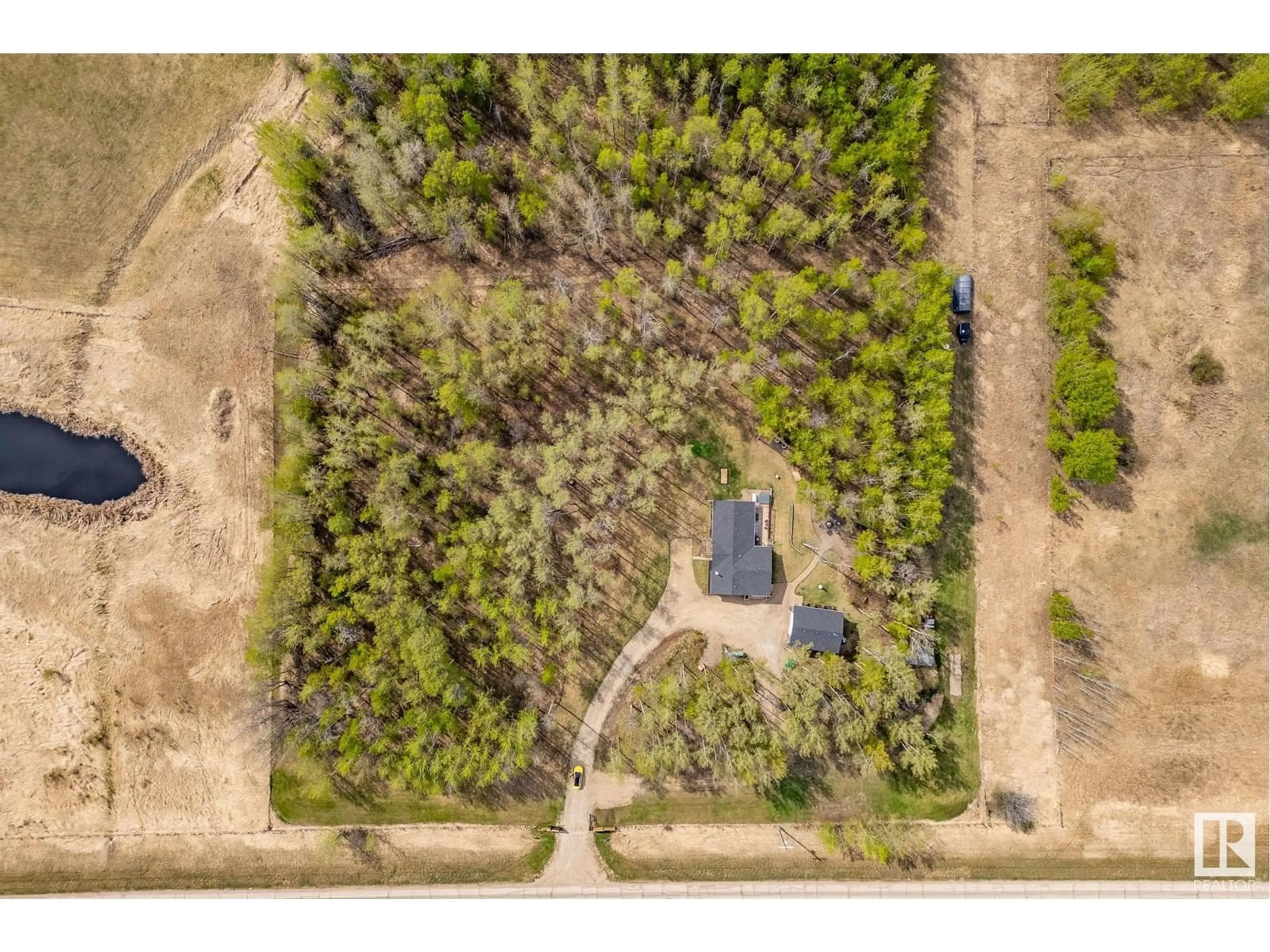 A pic from outside/outdoor area/front of a property/back of a property/a pic from drone, forest/trees view for 275035 HWY 616, Rural Wetaskiwin County Alberta T0C1Z0