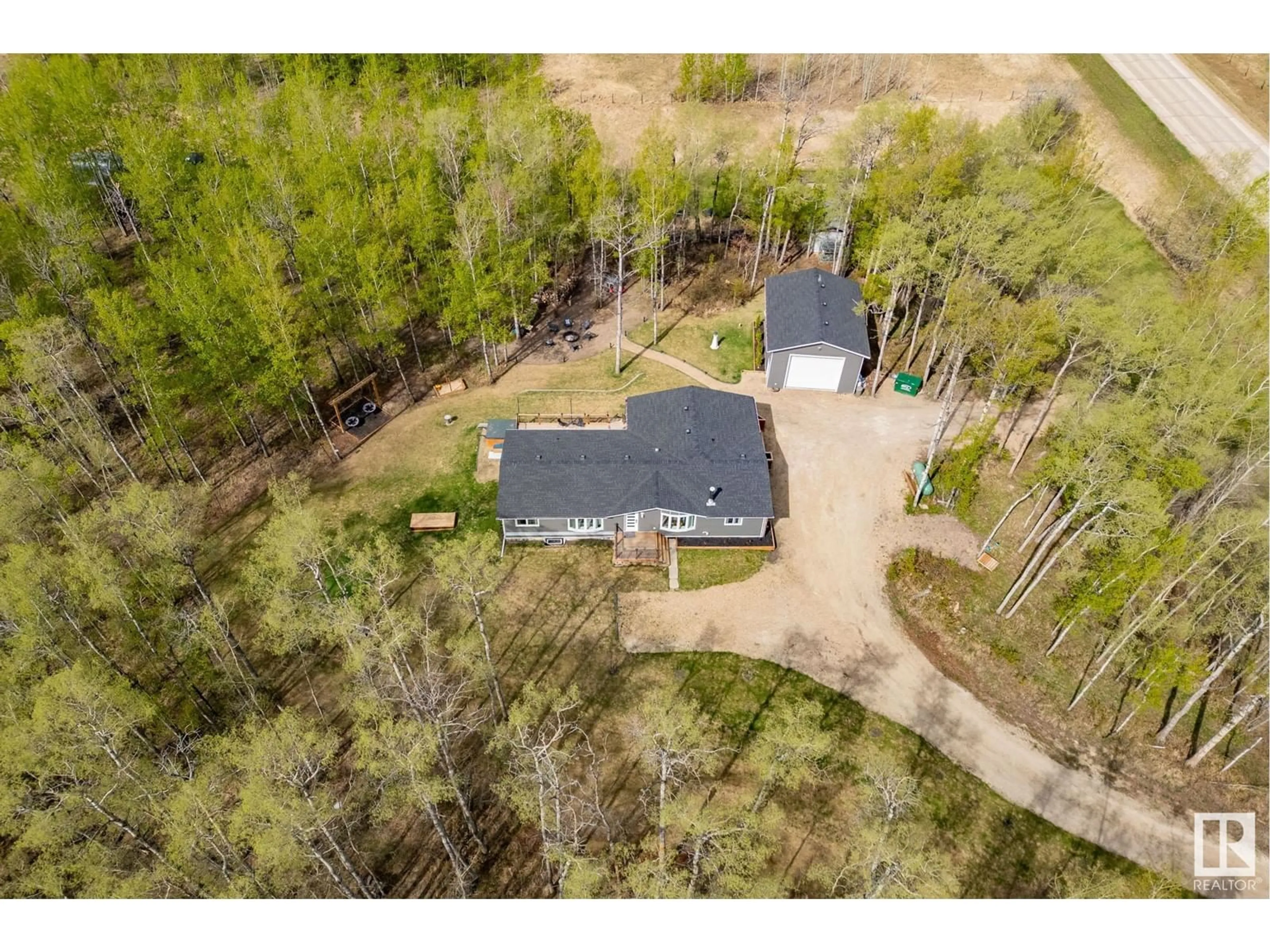 A pic from outside/outdoor area/front of a property/back of a property/a pic from drone, forest/trees view for 275035 HWY 616, Rural Wetaskiwin County Alberta T0C1Z0