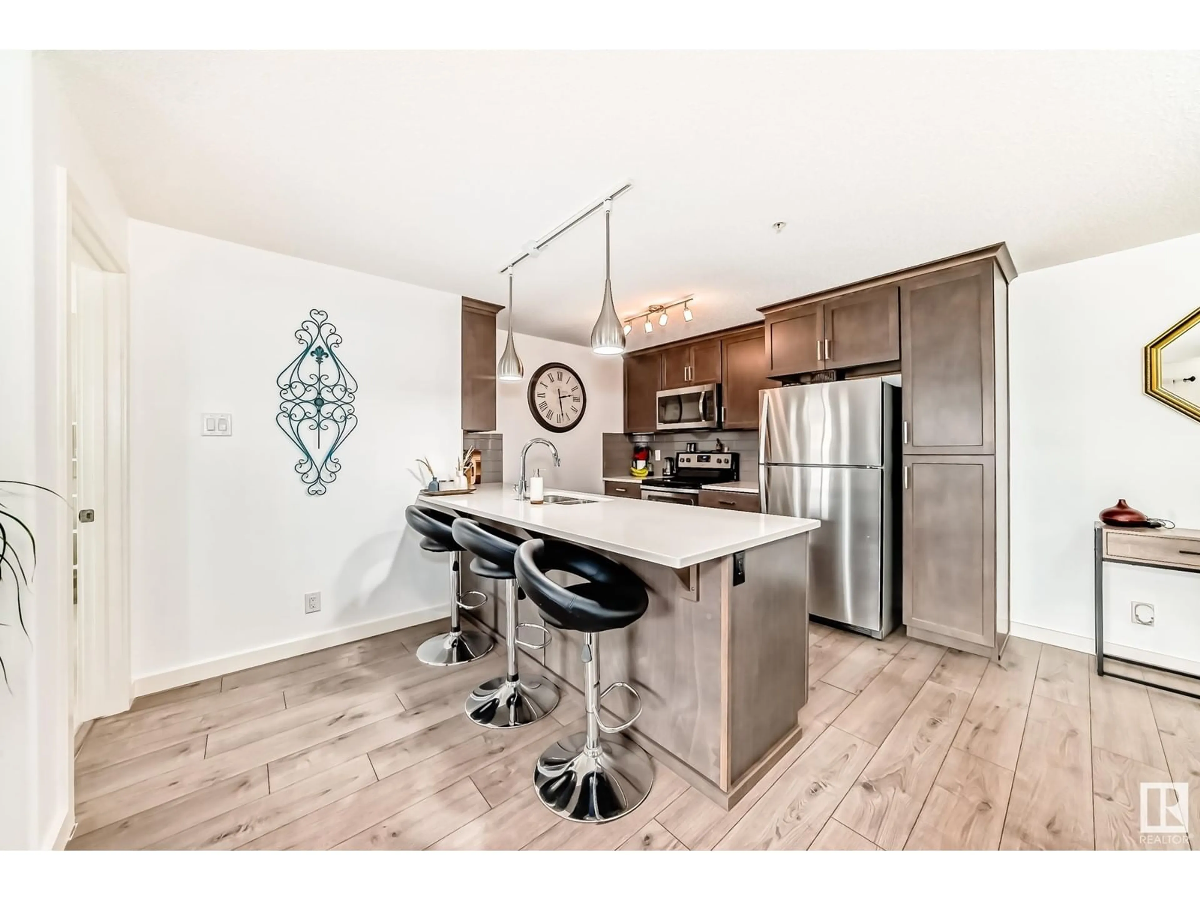 Open concept kitchen, unknown for #306 - 4008 SAVARYN DR, Edmonton Alberta T6X2E5