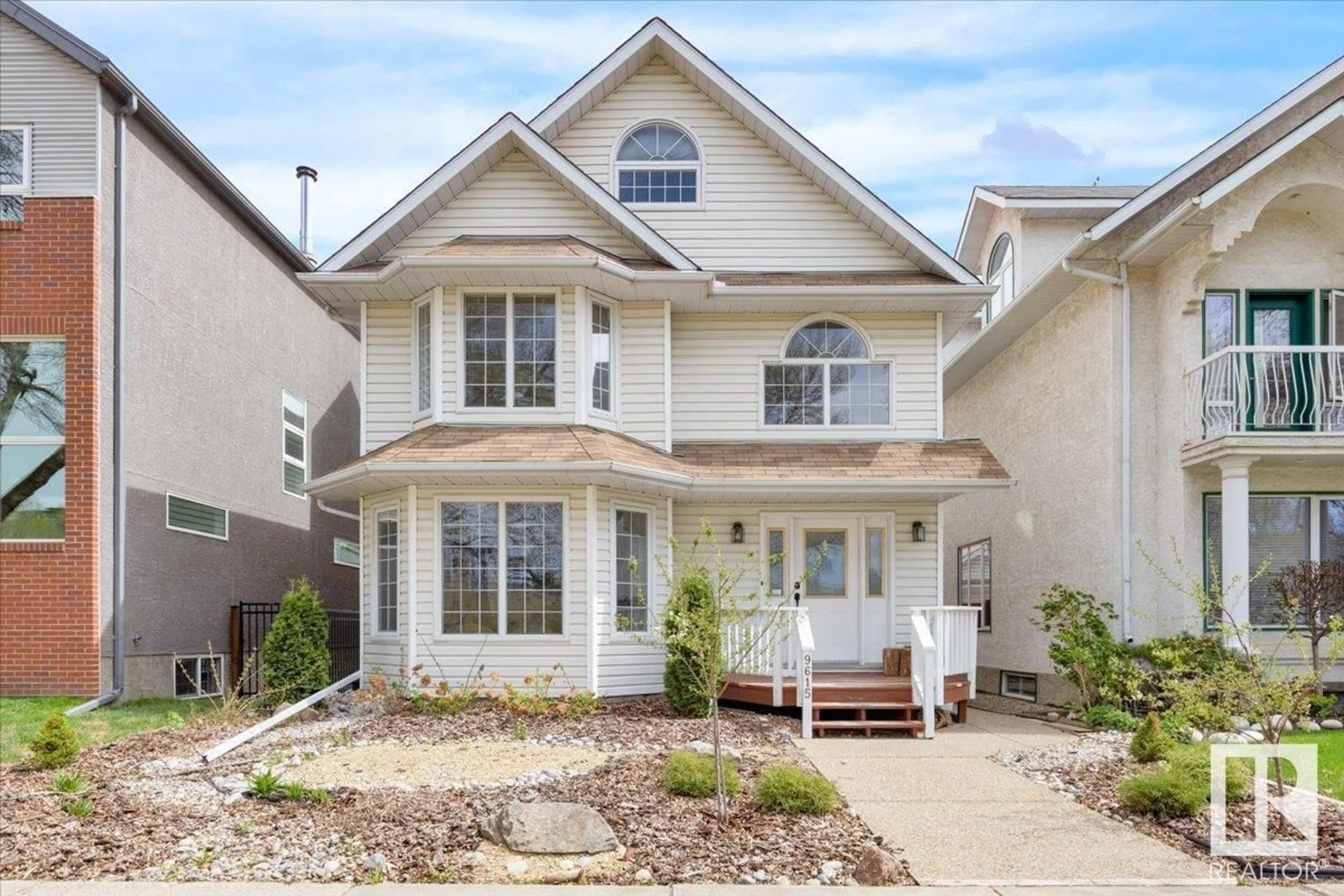 Home with vinyl exterior material, street for NW - 9615 101 ST, Edmonton Alberta T5K0W7