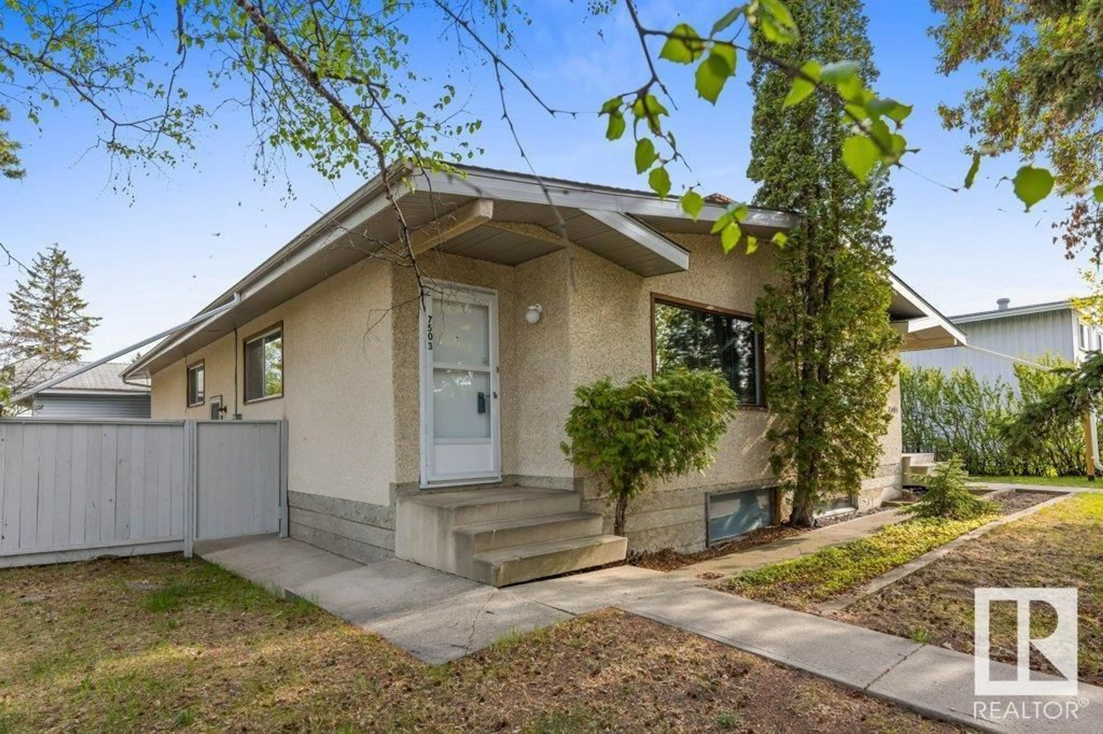 Home with vinyl exterior material, street for NW - 7503 36B AV, Edmonton Alberta T6K0L4