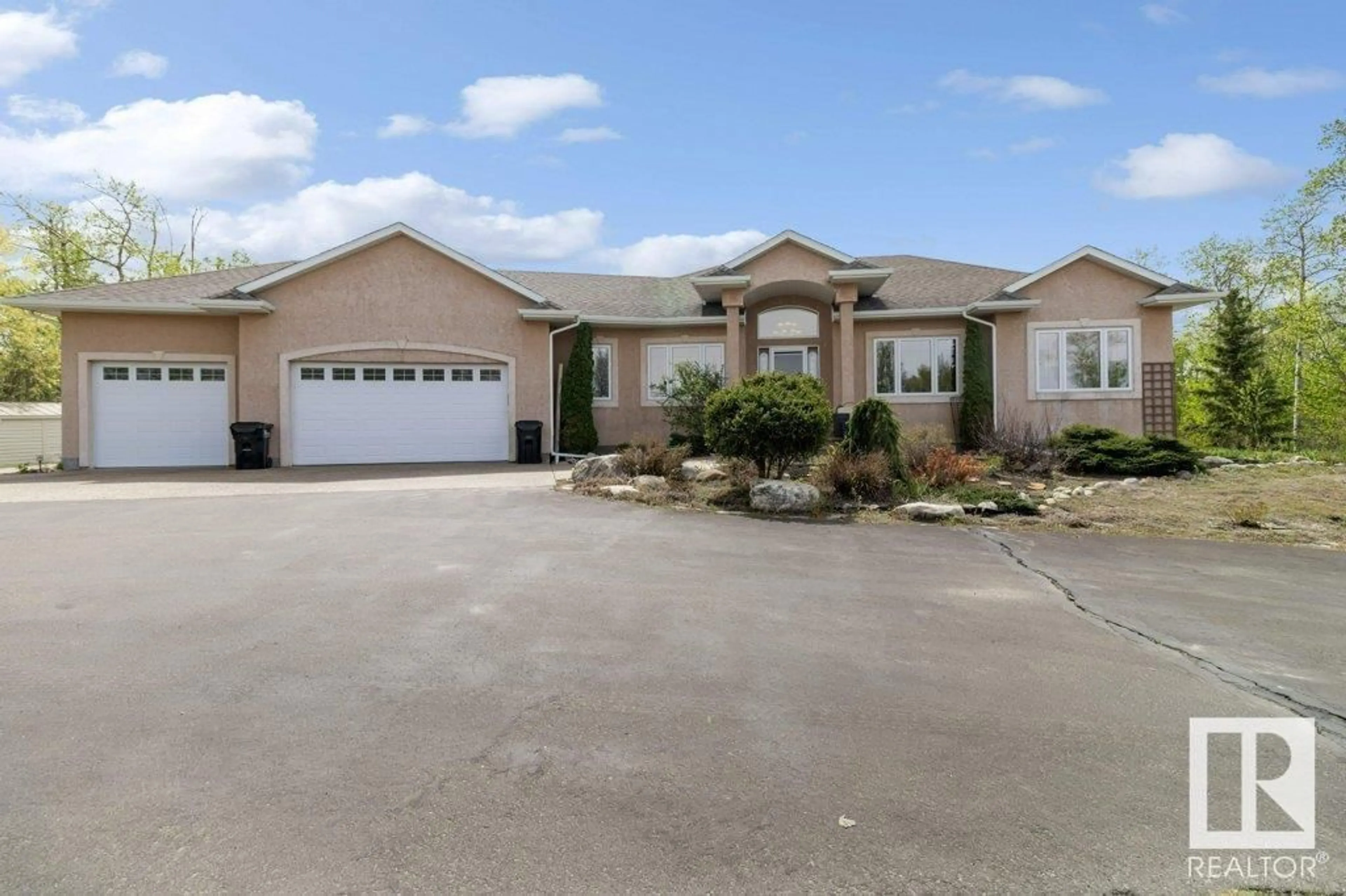 Home with vinyl exterior material, street for 60 21252 TWP ROAD ROAD, Rural Strathcona County Alberta T8G2C4