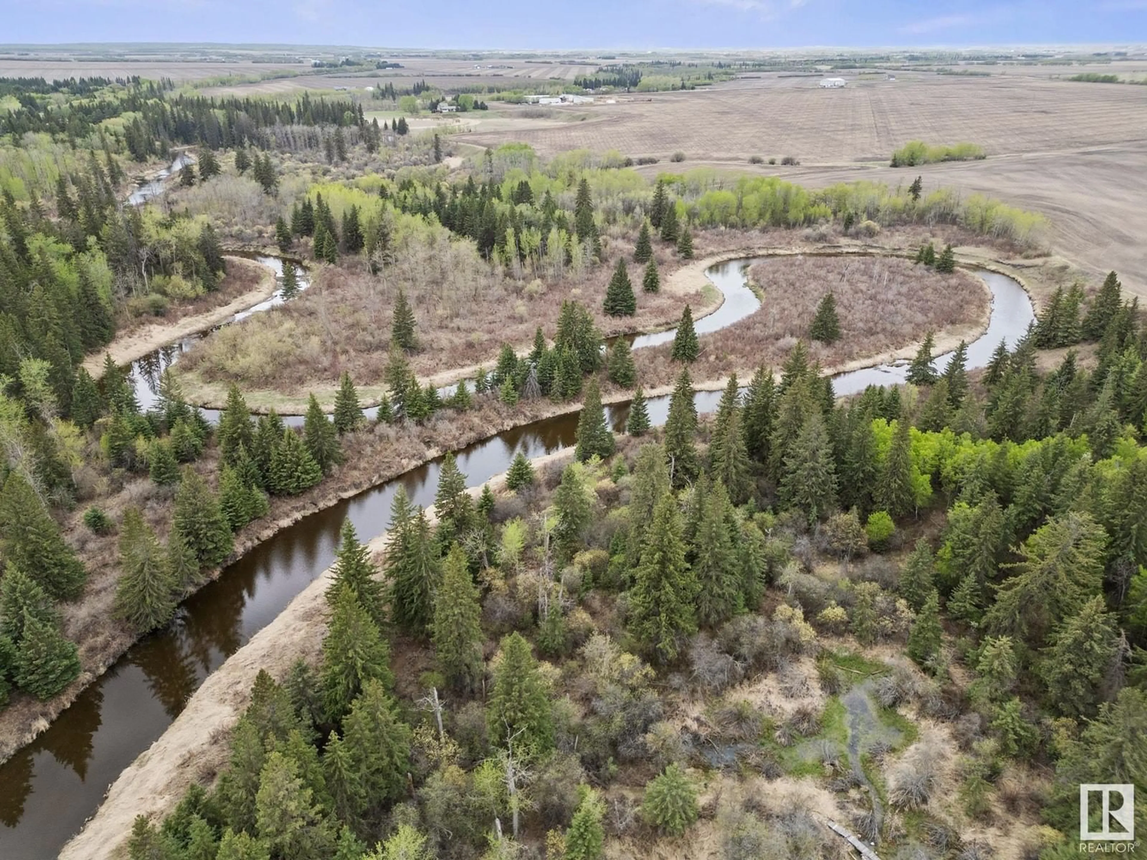 A pic from outside/outdoor area/front of a property/back of a property/a pic from drone, forest/trees view for 32 54006 RGE ROAD 261, Rural Sturgeon County Alberta T8T0C1
