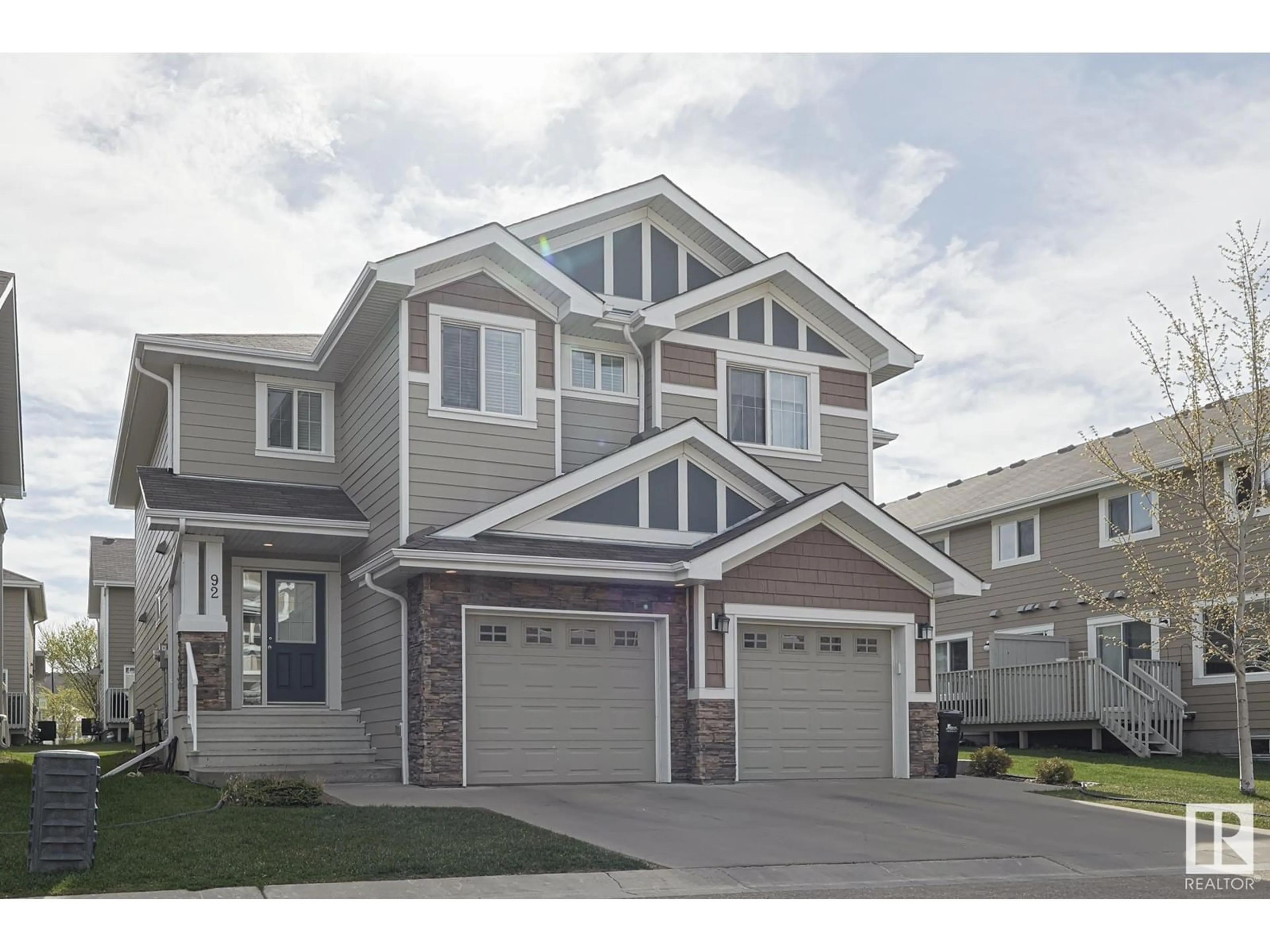 Home with vinyl exterior material, street for 219 - 92 CHARLOTTE WY, Sherwood Park Alberta T8H0T3