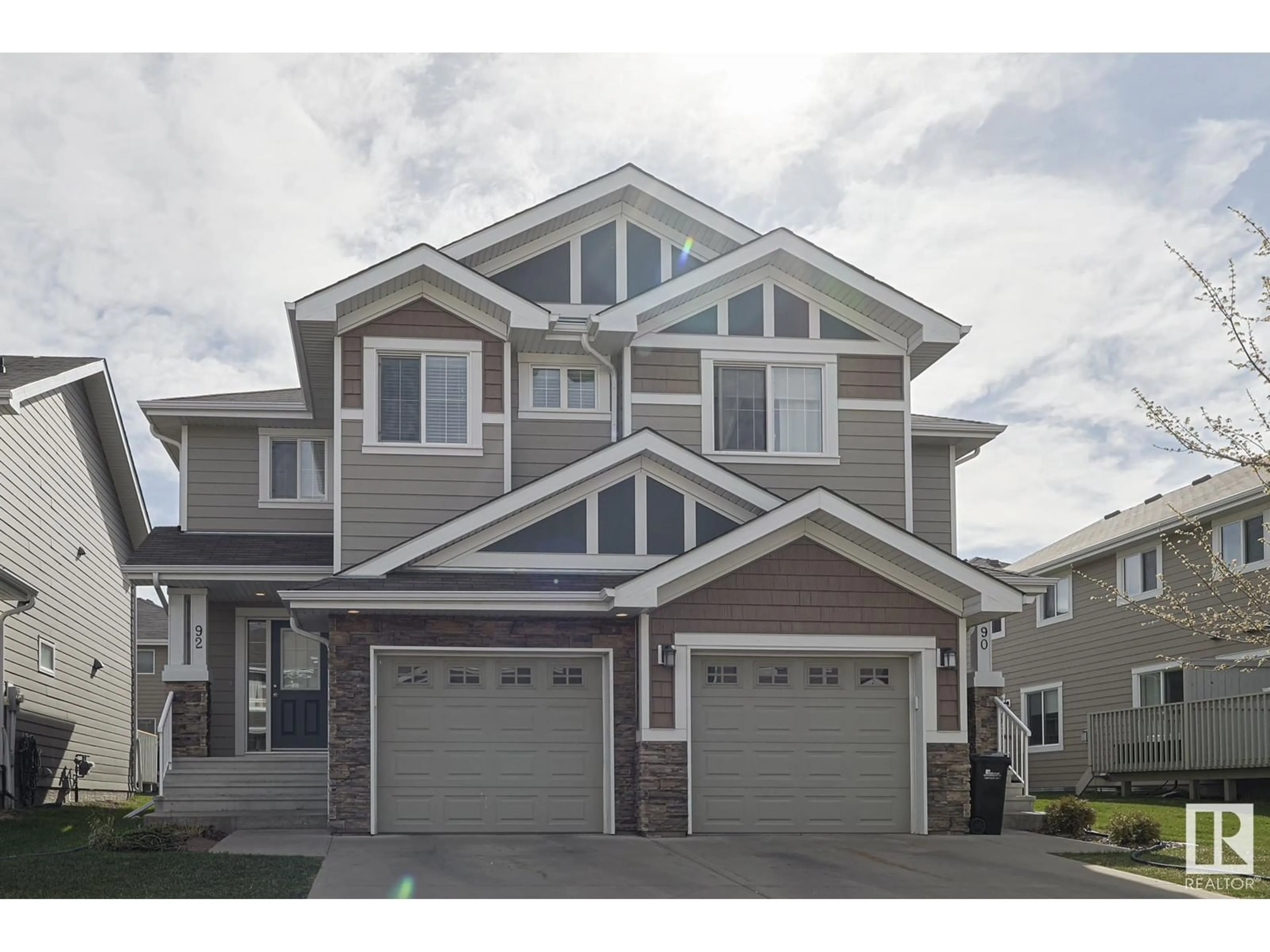 Home with vinyl exterior material, street for 219 - 92 CHARLOTTE WY, Sherwood Park Alberta T8H0T3