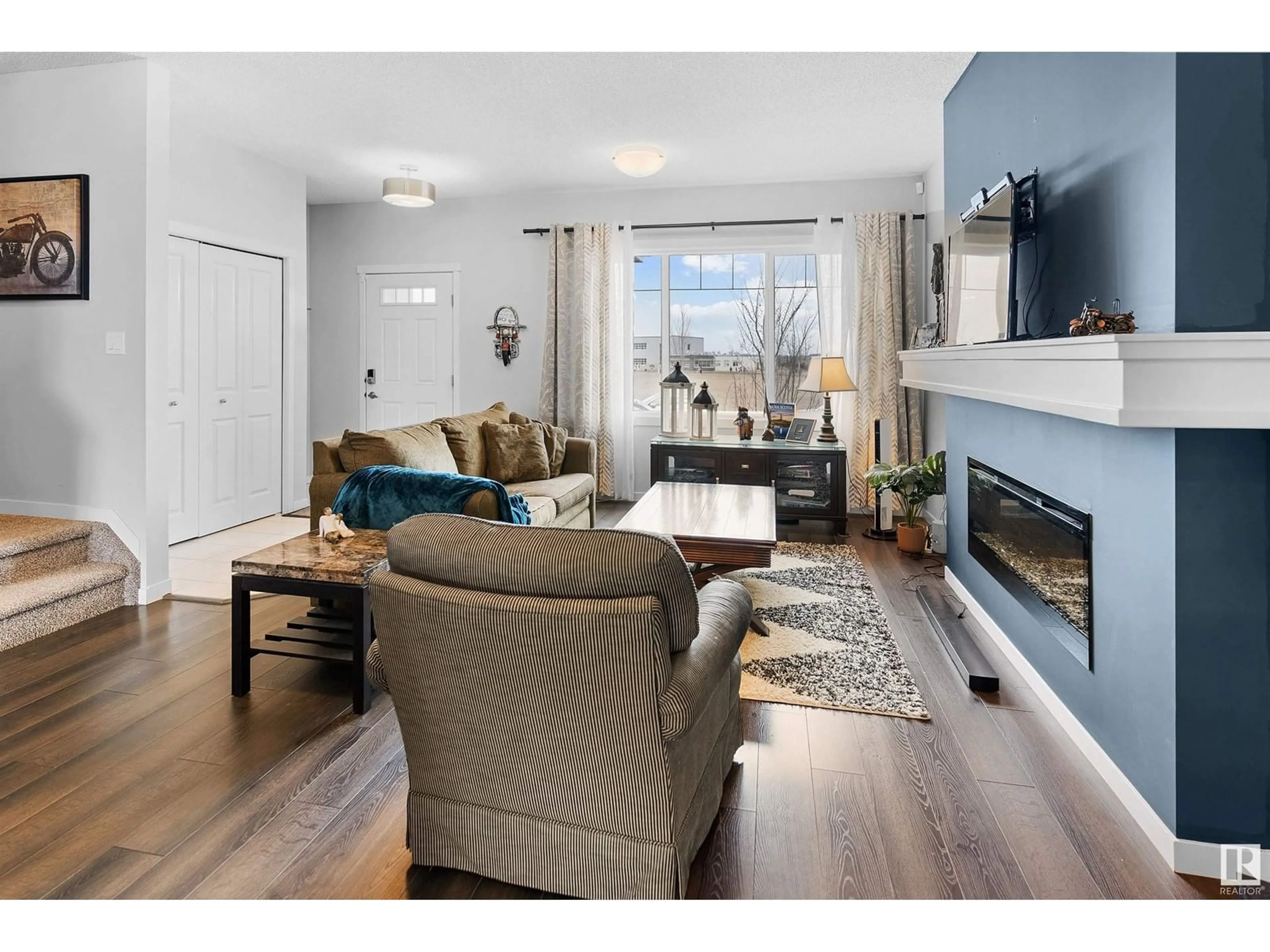 Living room with furniture, wood/laminate floor for 43 CALISTA WY, Spruce Grove Alberta T7X0Y7