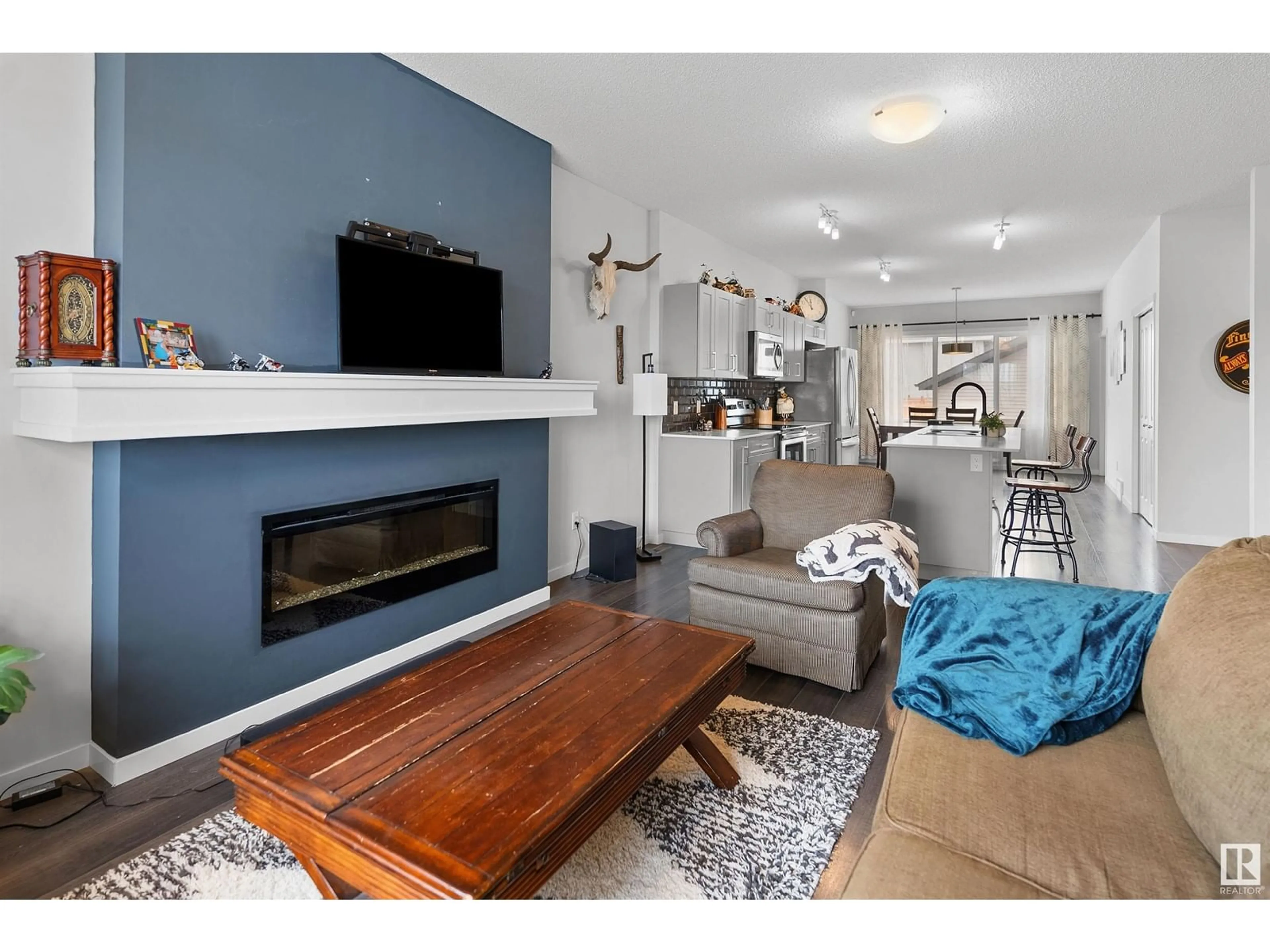 Living room with furniture, wood/laminate floor for 43 CALISTA WY, Spruce Grove Alberta T7X0Y7