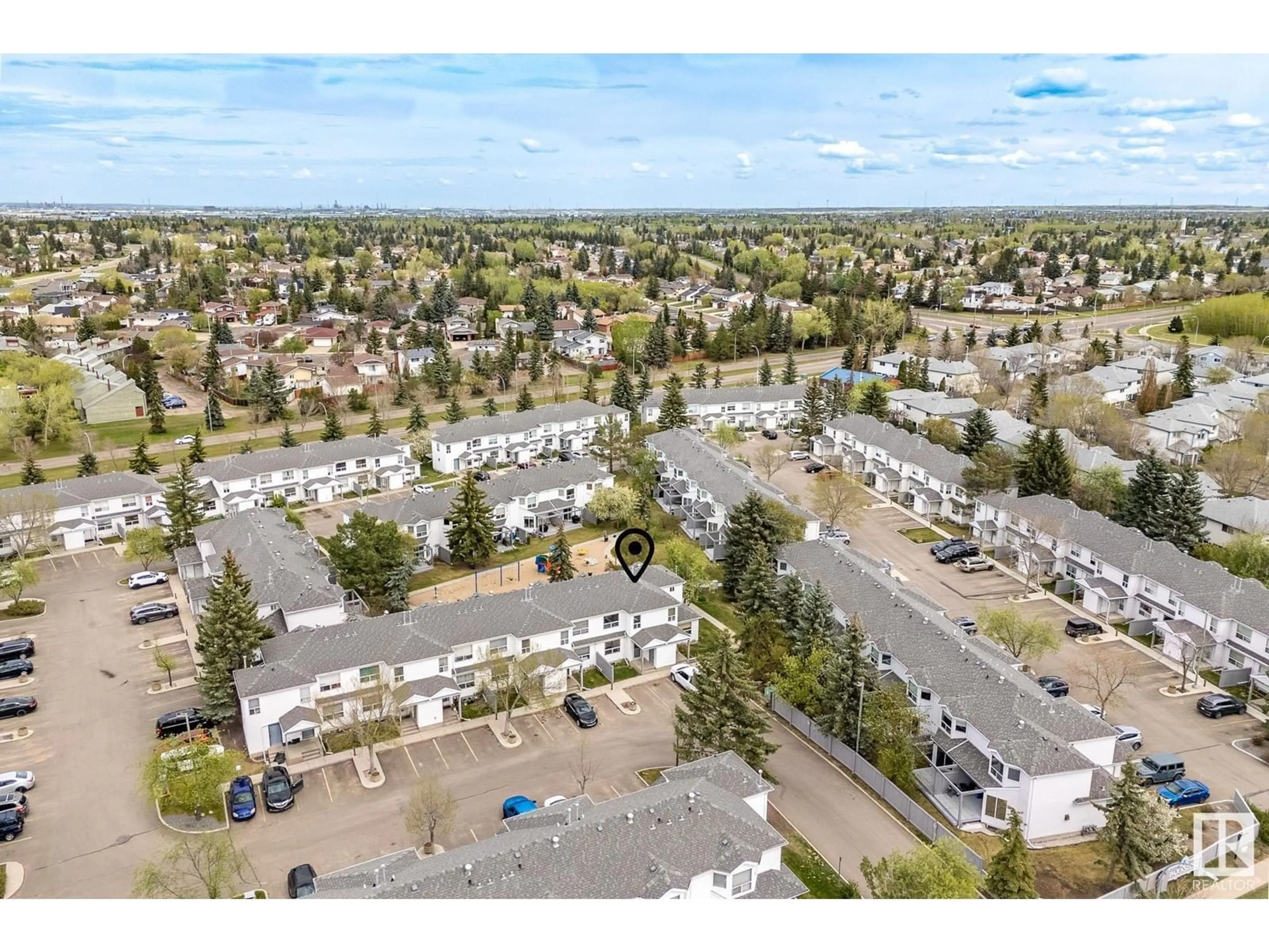 A pic from outside/outdoor area/front of a property/back of a property/a pic from drone, mountain view for 603 - 120 YOUVILLE DR, Edmonton Alberta T6L6V8