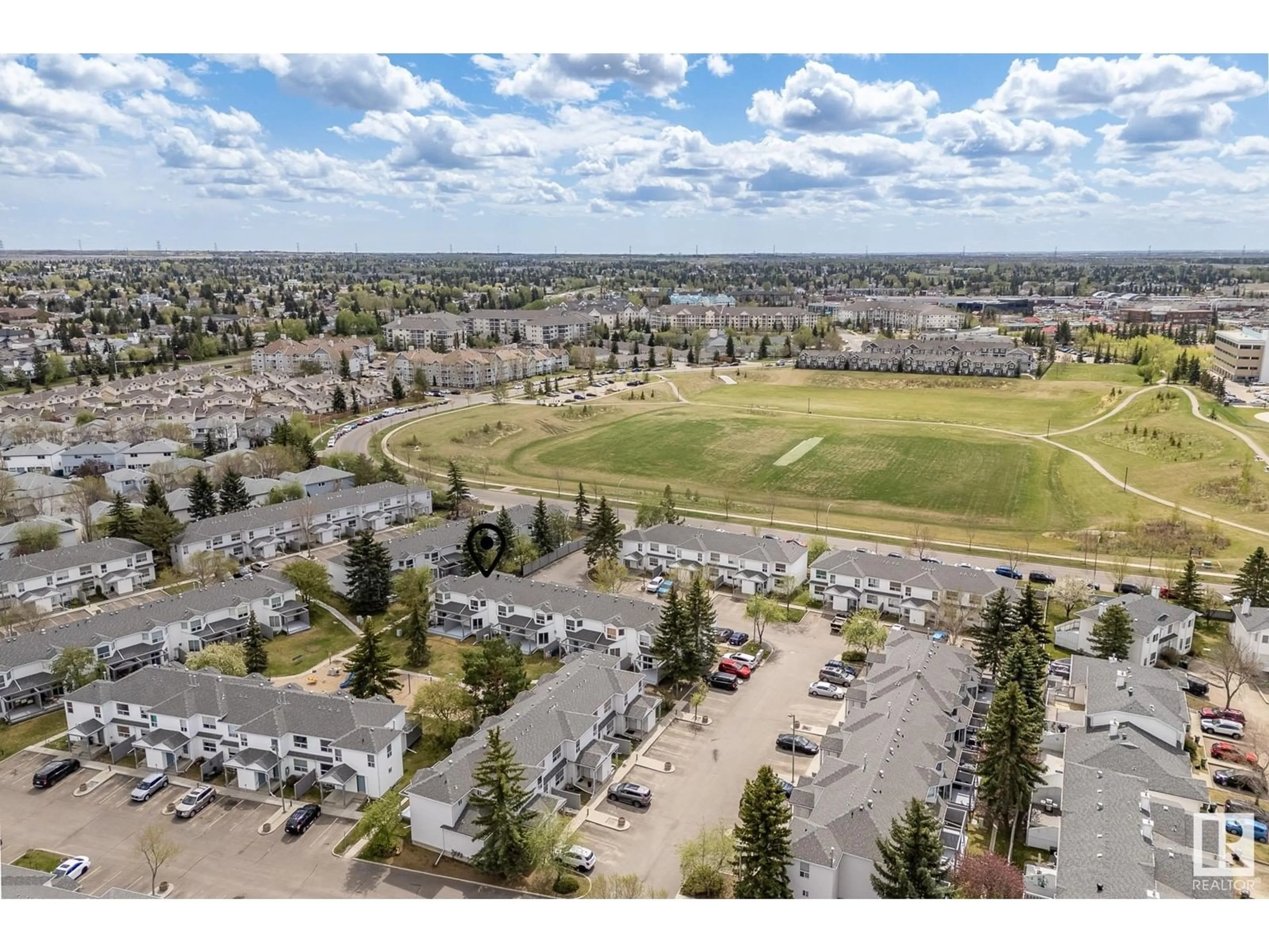 A pic from outside/outdoor area/front of a property/back of a property/a pic from drone, mountain view for 603 - 120 YOUVILLE DR, Edmonton Alberta T6L6V8