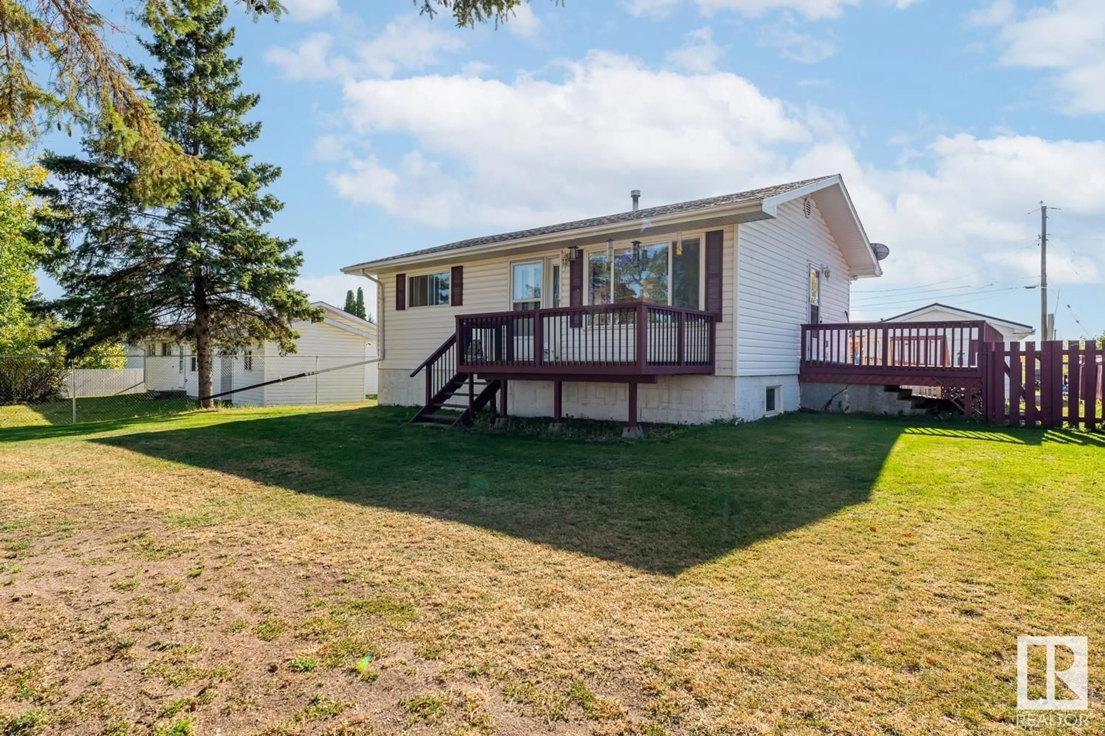 A pic from outside/outdoor area/front of a property/back of a property/a pic from drone, water/lake/river/ocean view for 5013 PARKVIEW CR, Cold Lake Alberta T9M1S7