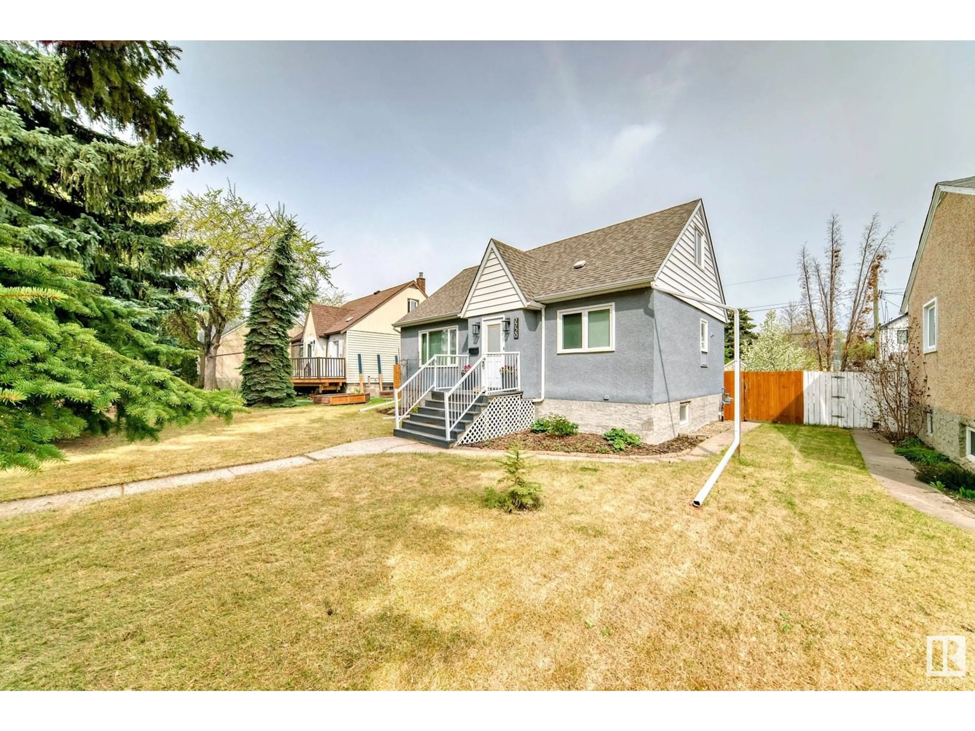 A pic from outside/outdoor area/front of a property/back of a property/a pic from drone, street for 7720 77 AV, Edmonton Alberta T6C0K7