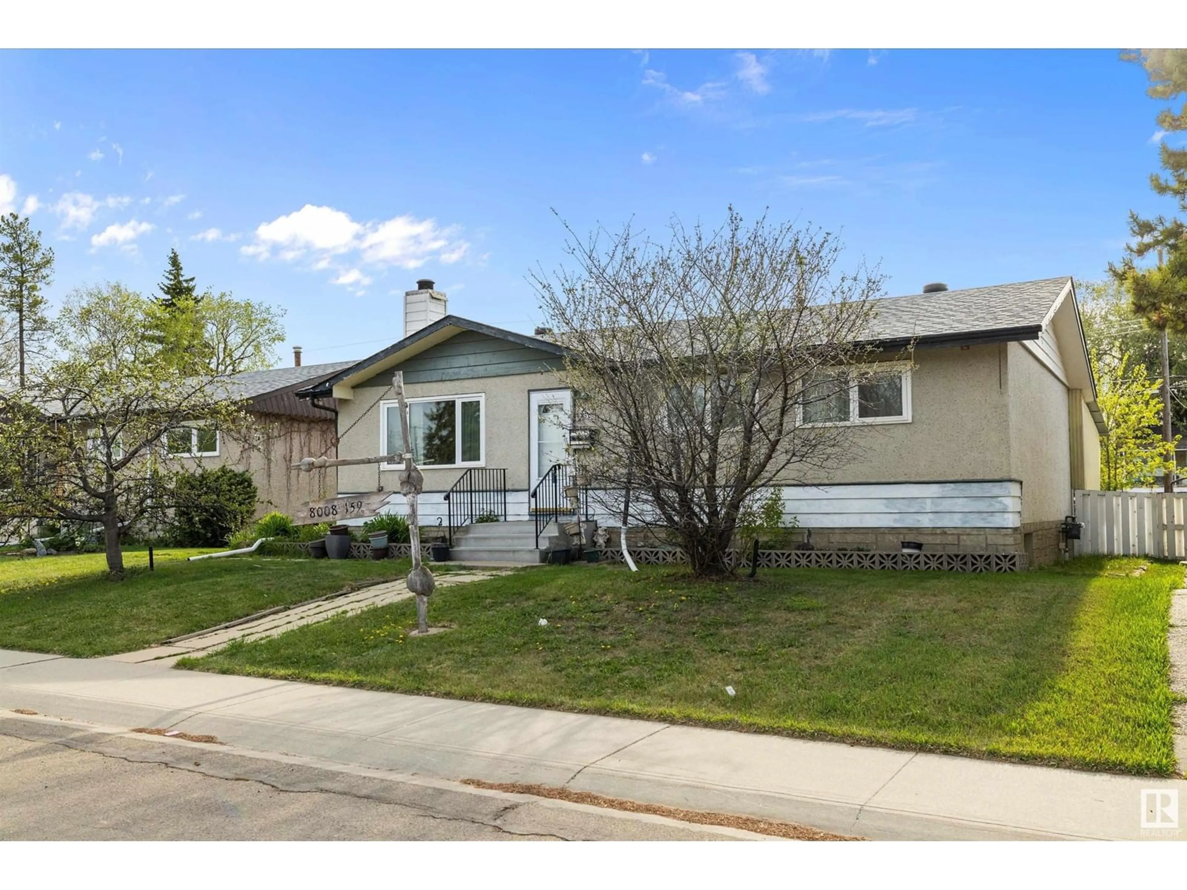 Home with vinyl exterior material, street for NW - 8008 159 ST, Edmonton Alberta T5R2E4
