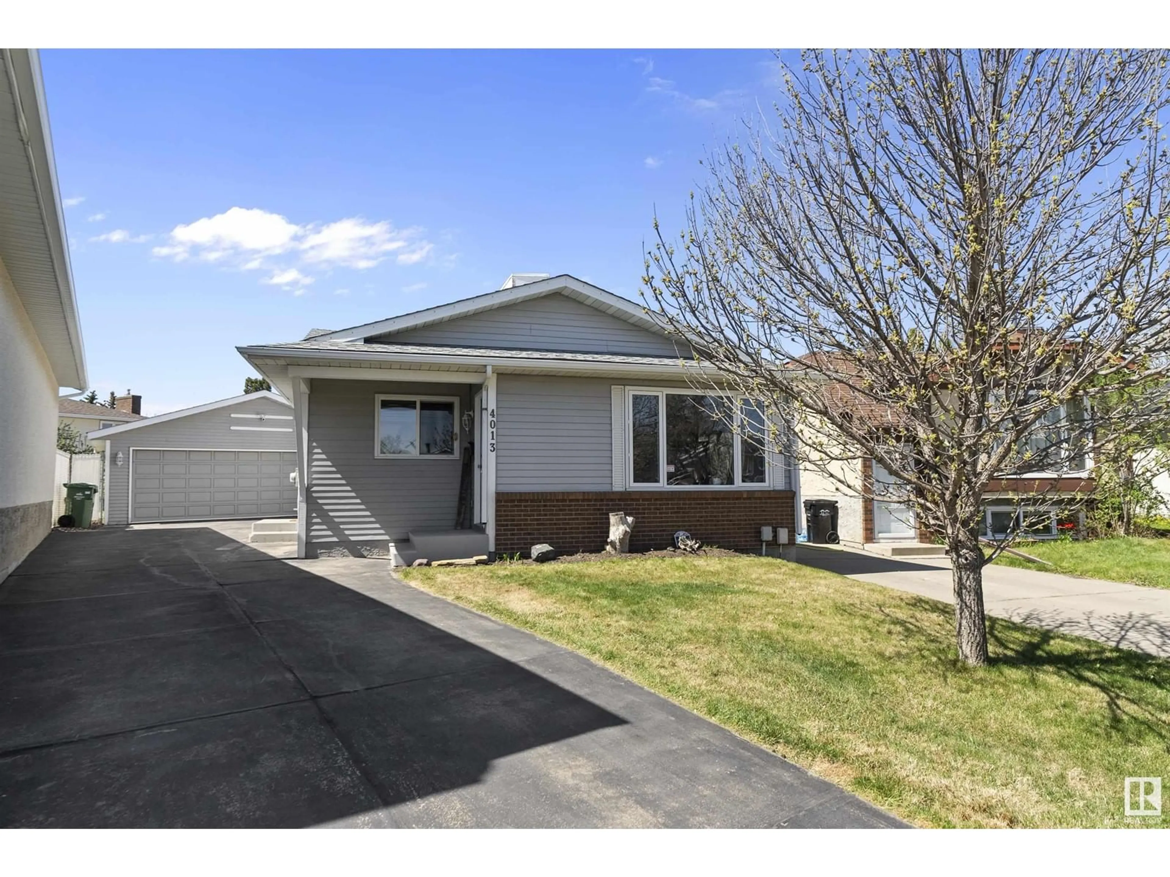 Home with vinyl exterior material, street for 4013 43B AVE, Leduc Alberta T9E4V2