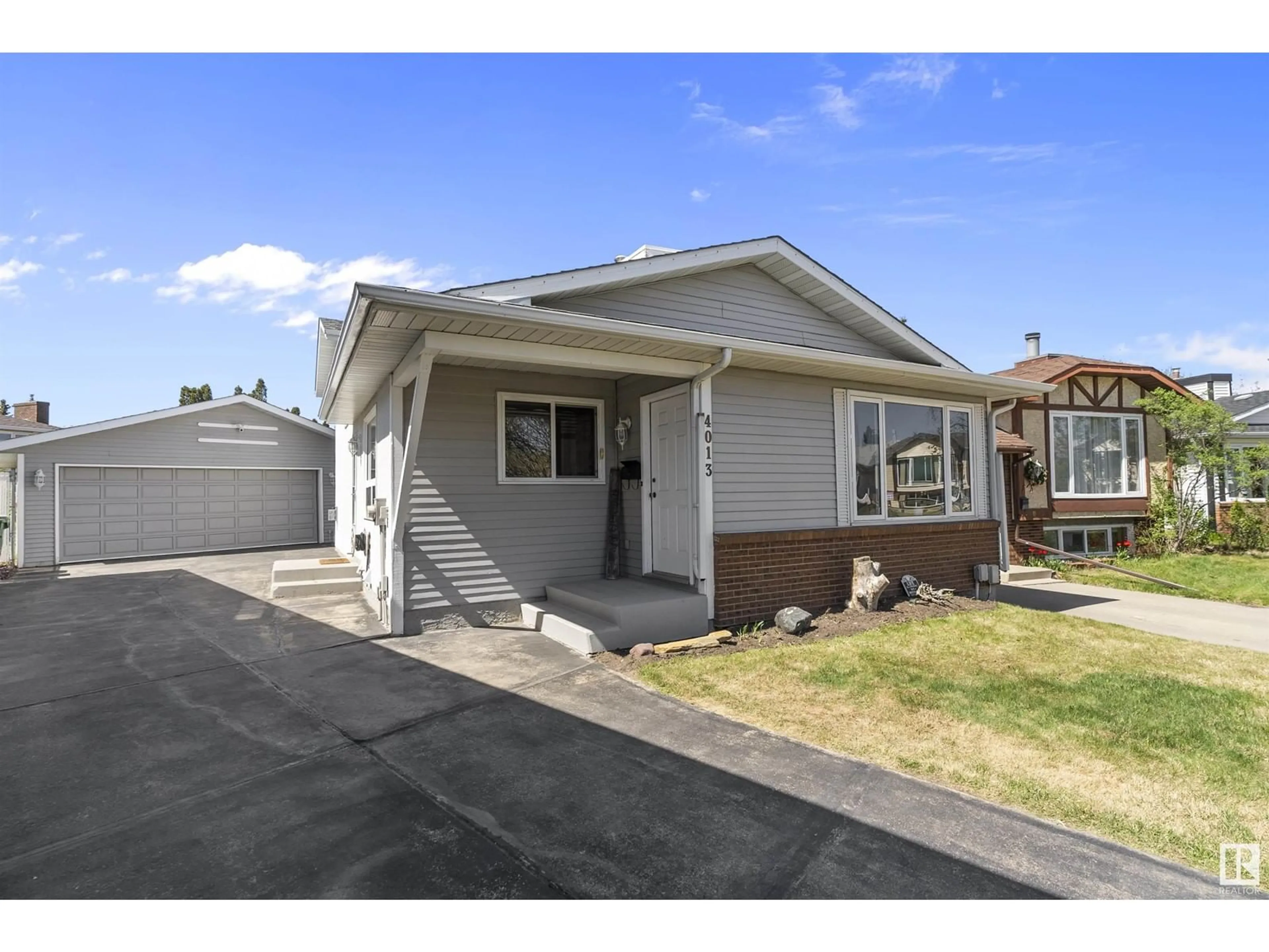 Home with vinyl exterior material, street for 4013 43B AVE, Leduc Alberta T9E4V2