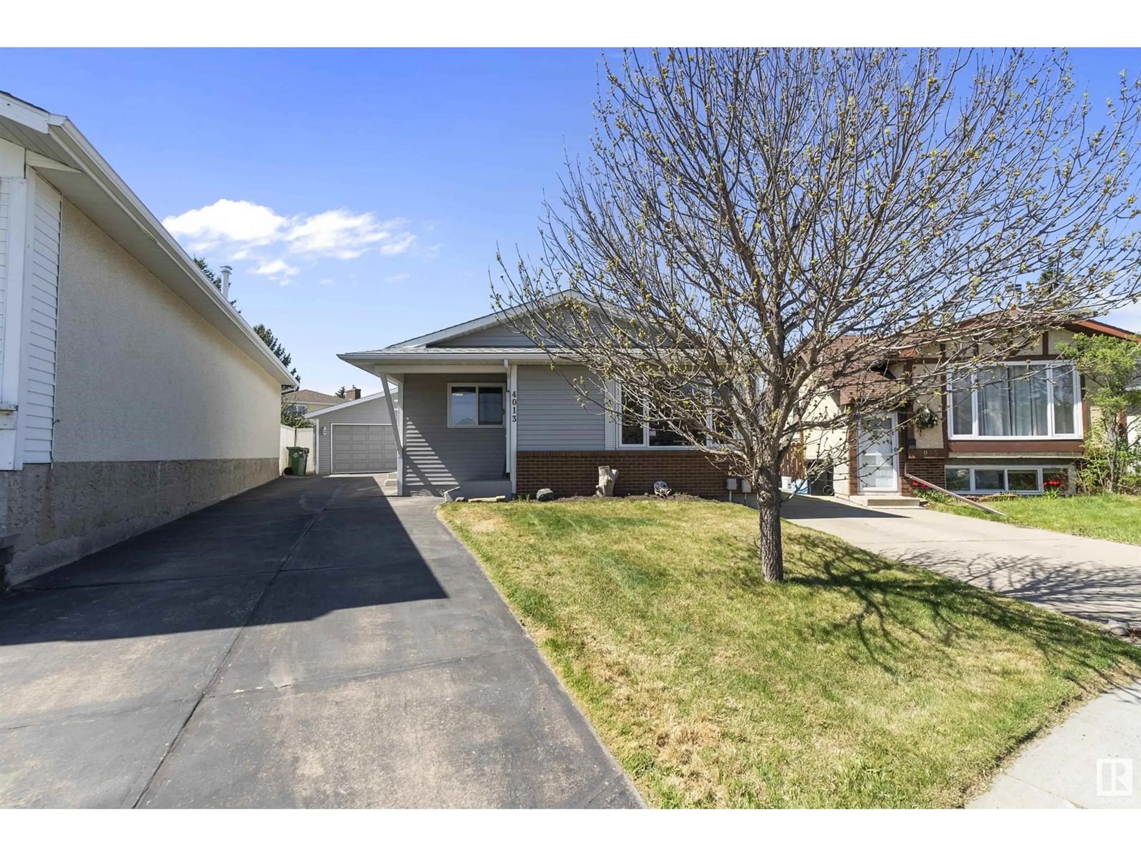 Home with vinyl exterior material, street for 4013 43B AVE, Leduc Alberta T9E4V2