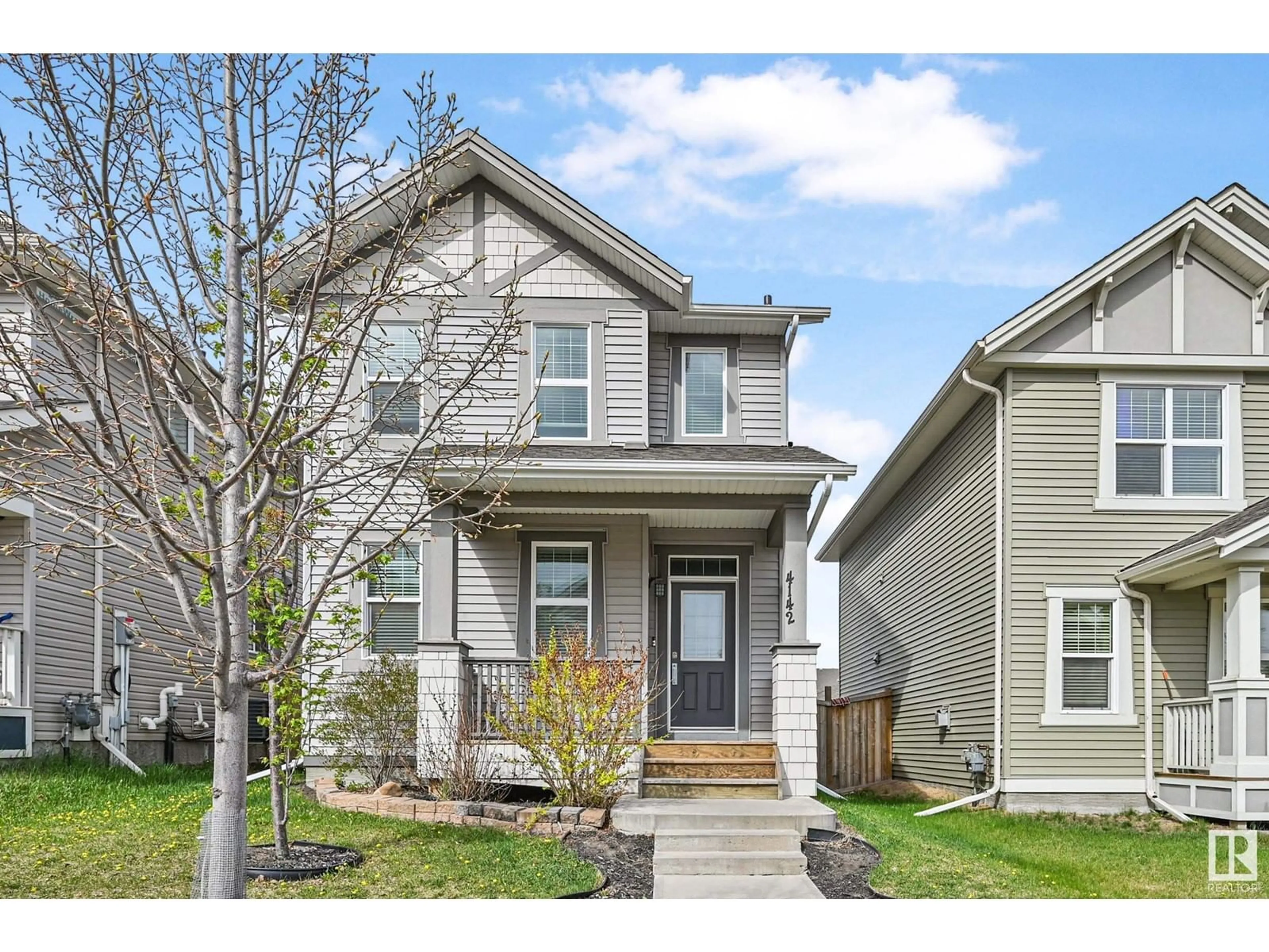 Home with vinyl exterior material, street for NW - 4142 6A ST, Edmonton Alberta T6T0T6