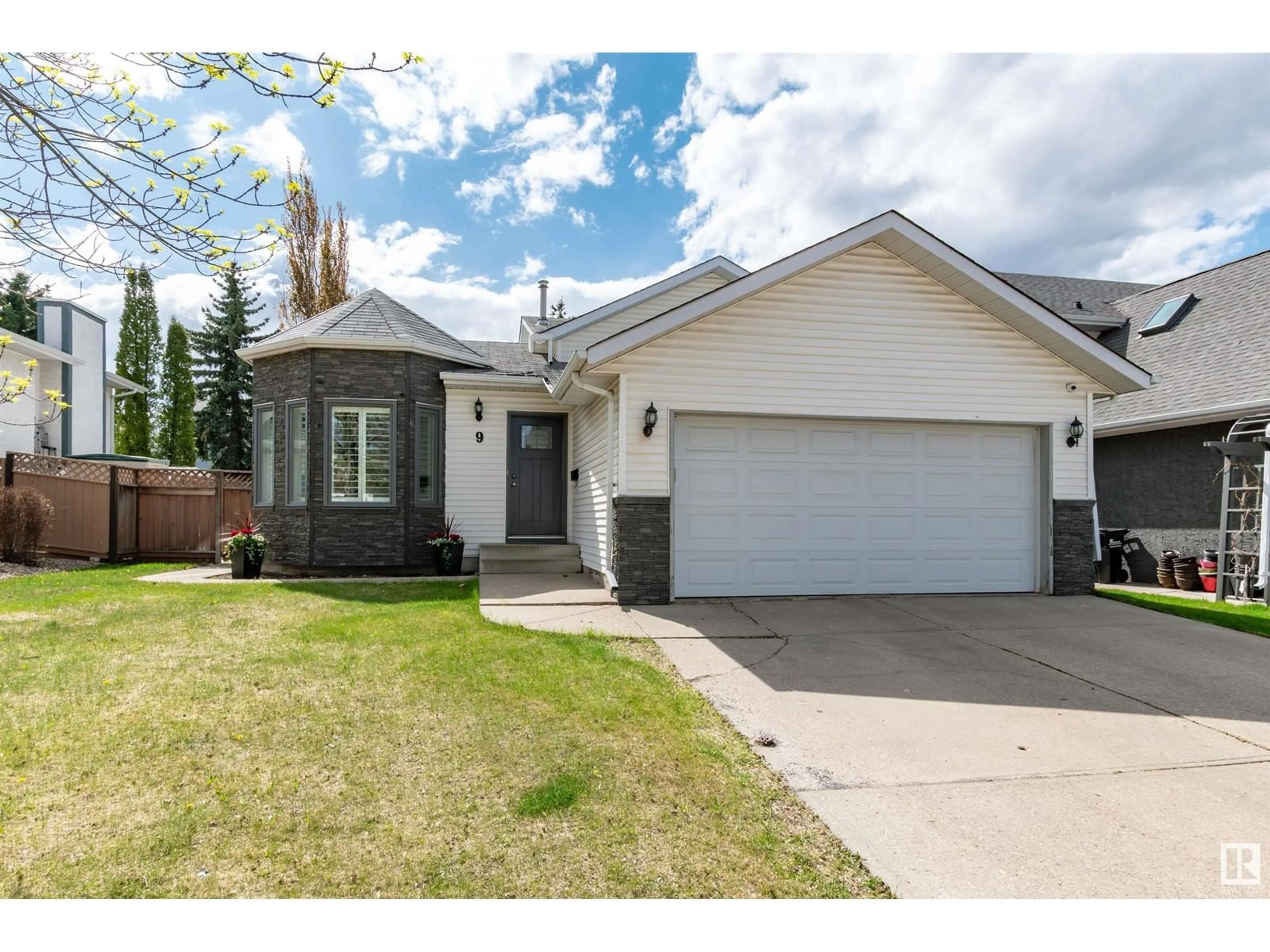 Home with vinyl exterior material, street for 9 COACHMAN, Sherwood Park Alberta T8H1B7