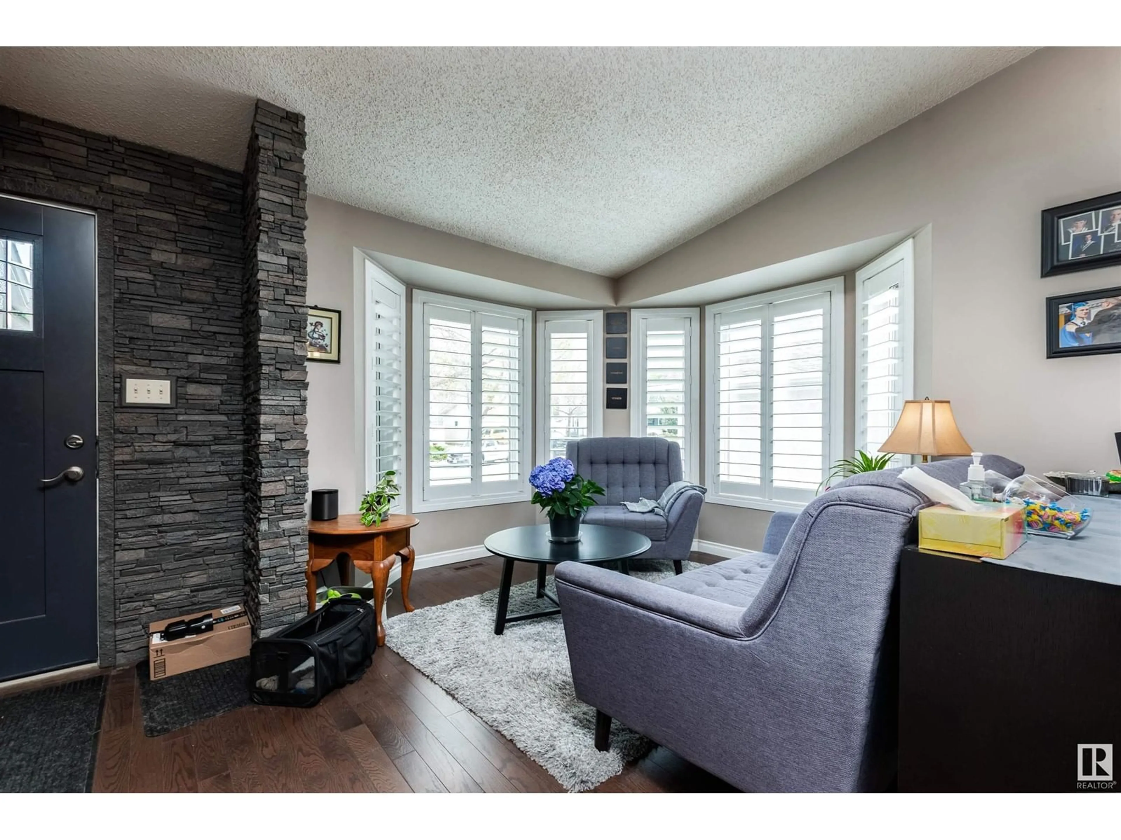 Living room with furniture, wood/laminate floor for 9 COACHMAN, Sherwood Park Alberta T8H1B7
