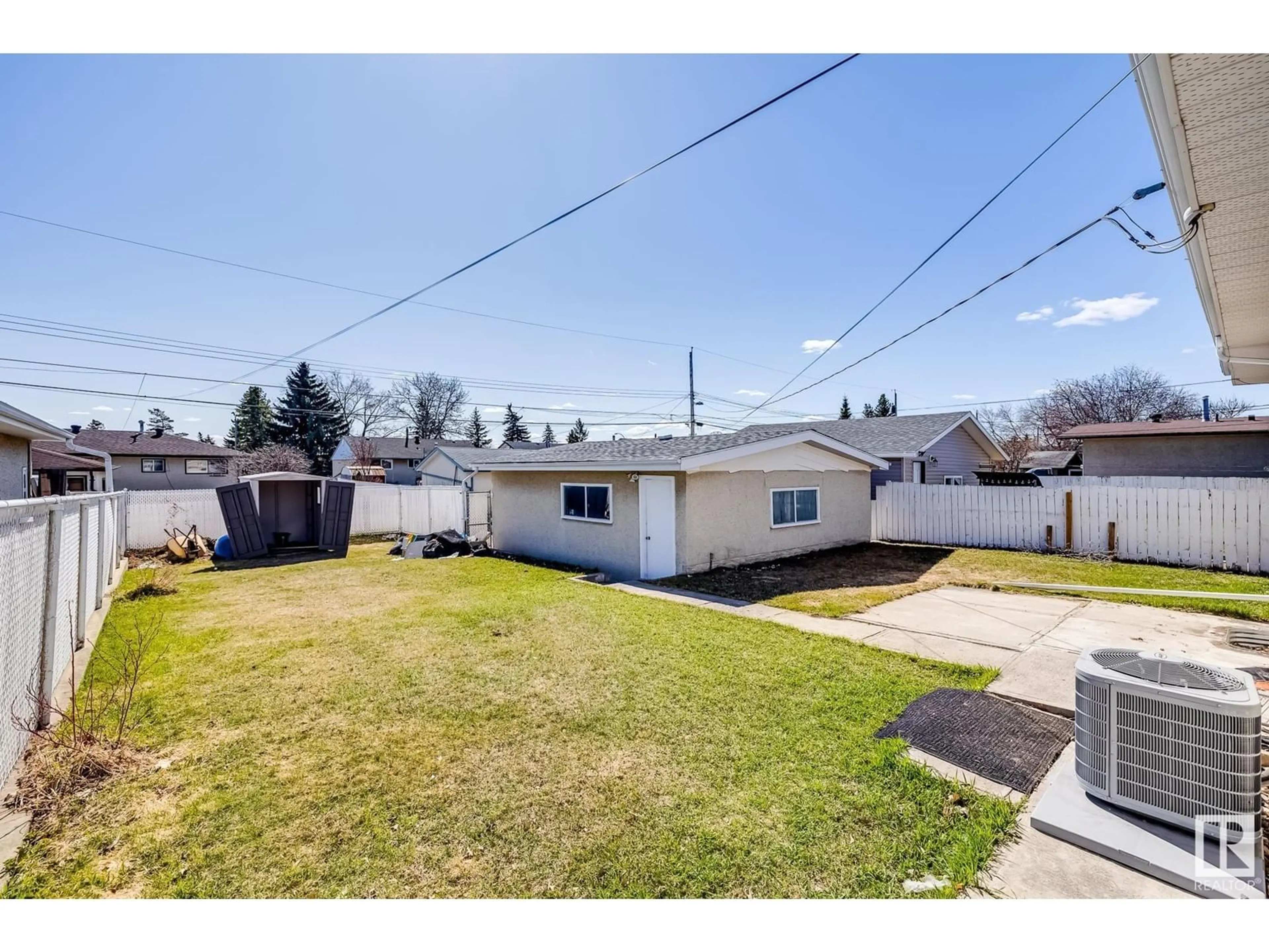 A pic from outside/outdoor area/front of a property/back of a property/a pic from drone, street for 8011 132 AV, Edmonton Alberta T5C2B3