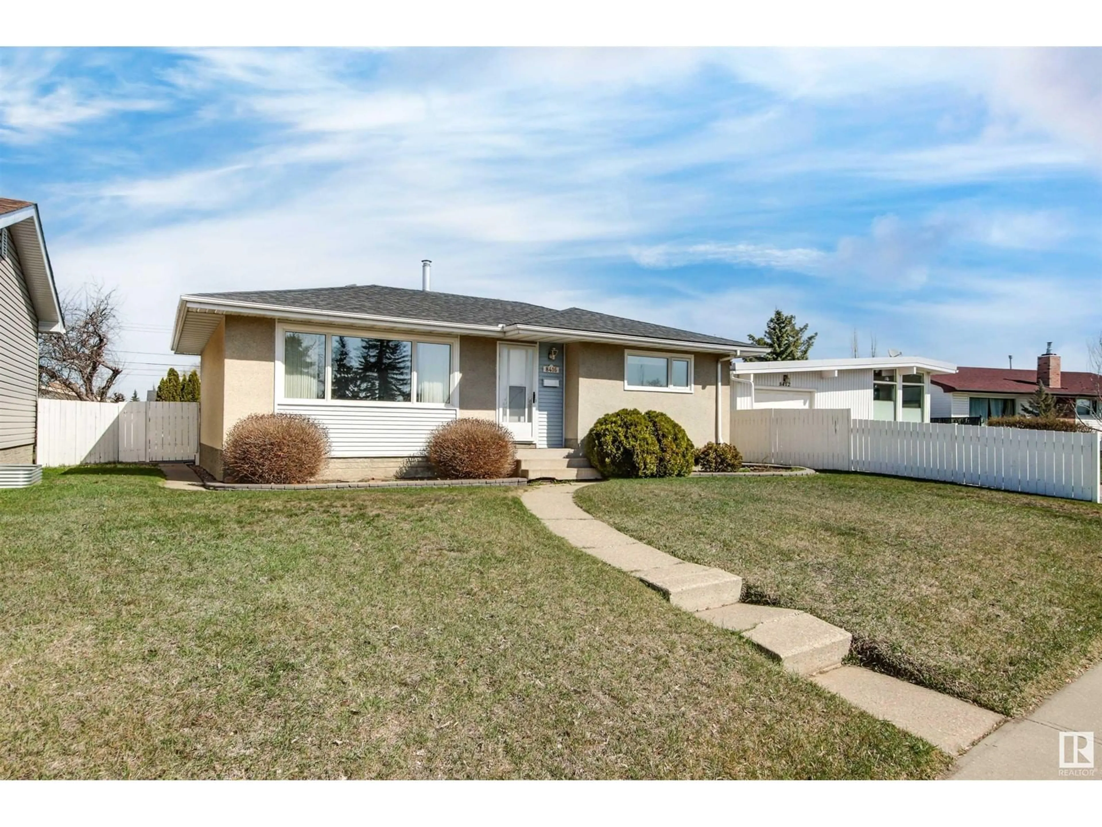 Home with vinyl exterior material, street for 8416 135A AV, Edmonton Alberta T5E1R6