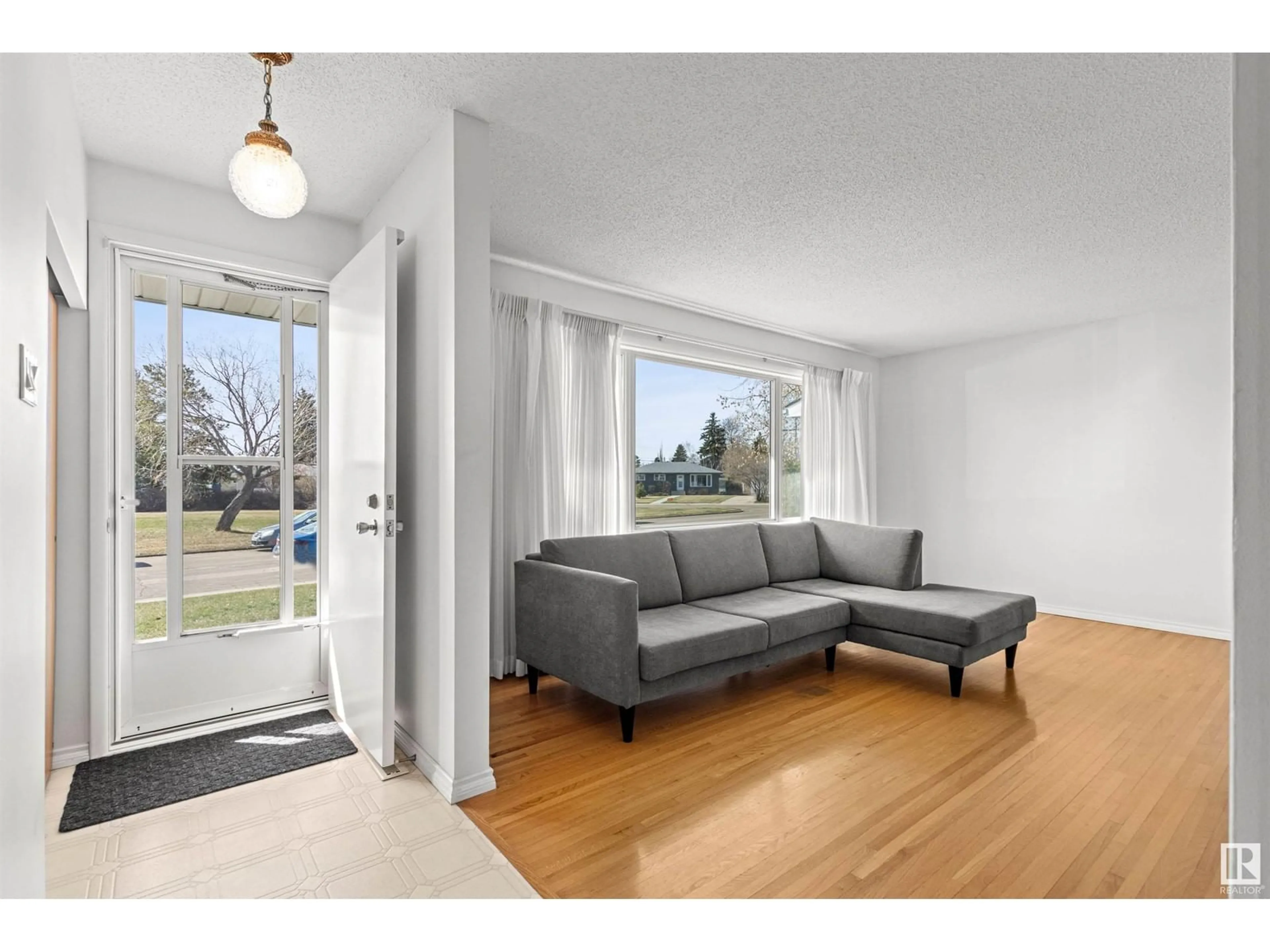 Living room with furniture, unknown for 8416 135A AV, Edmonton Alberta T5E1R6