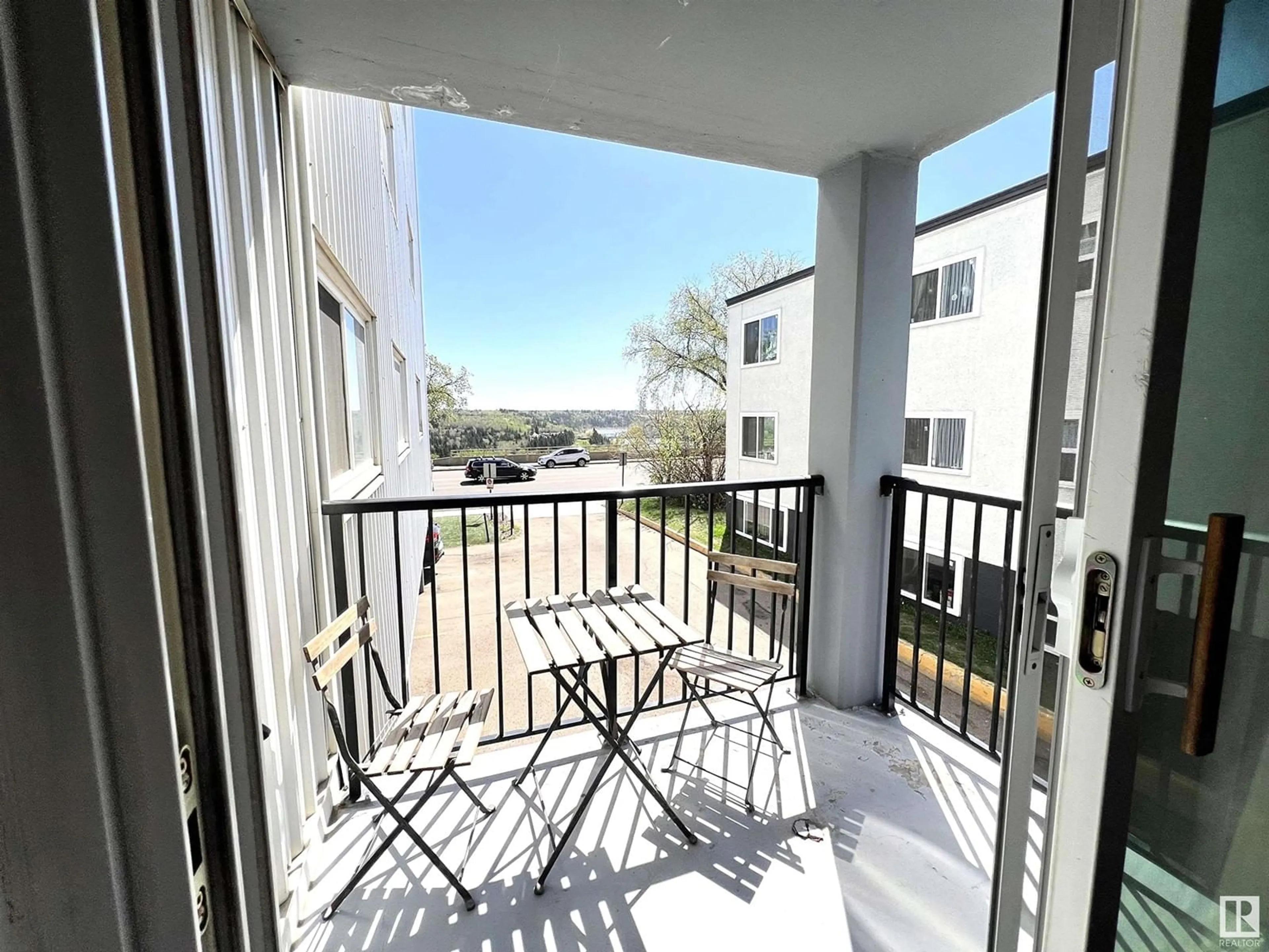 Balcony in the apartment, city buildings view from balcony for #103 - 8310 JASPER AV, Edmonton Alberta T5H3S3