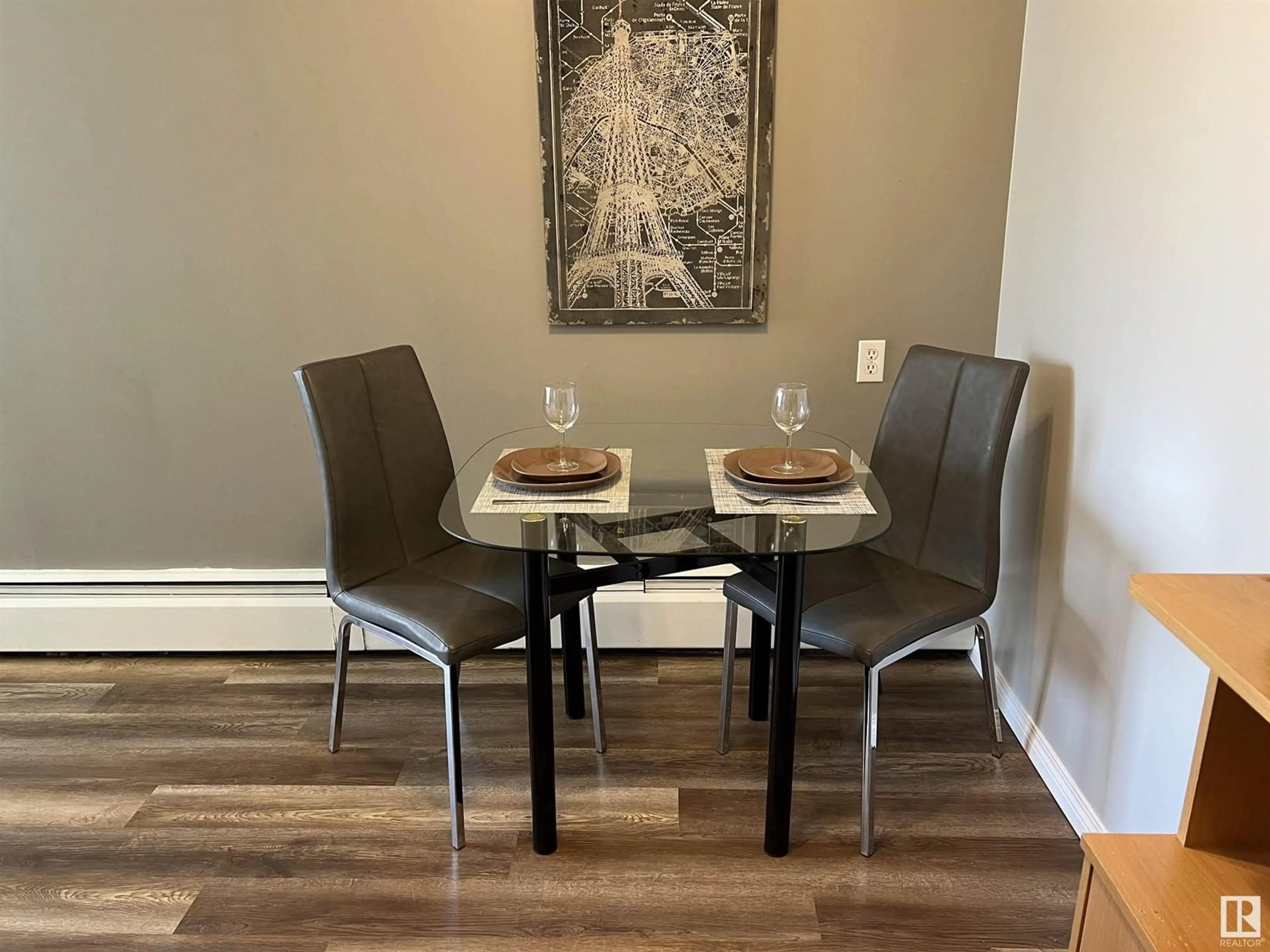 Dining room, wood/laminate floor for #103 - 8310 JASPER AV, Edmonton Alberta T5H3S3