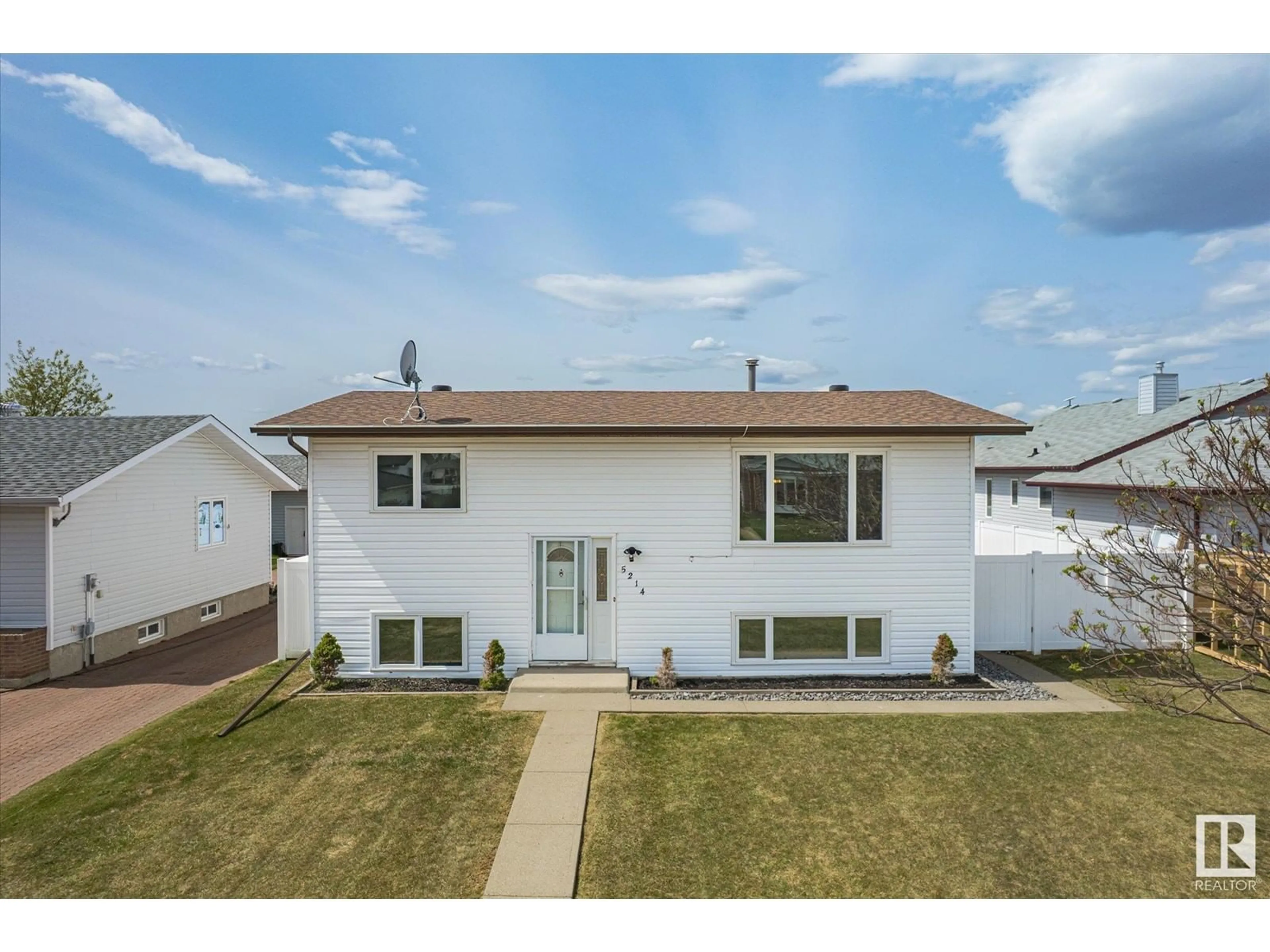 Home with vinyl exterior material, street for 5214 53 ST, Legal Alberta T0G1L0