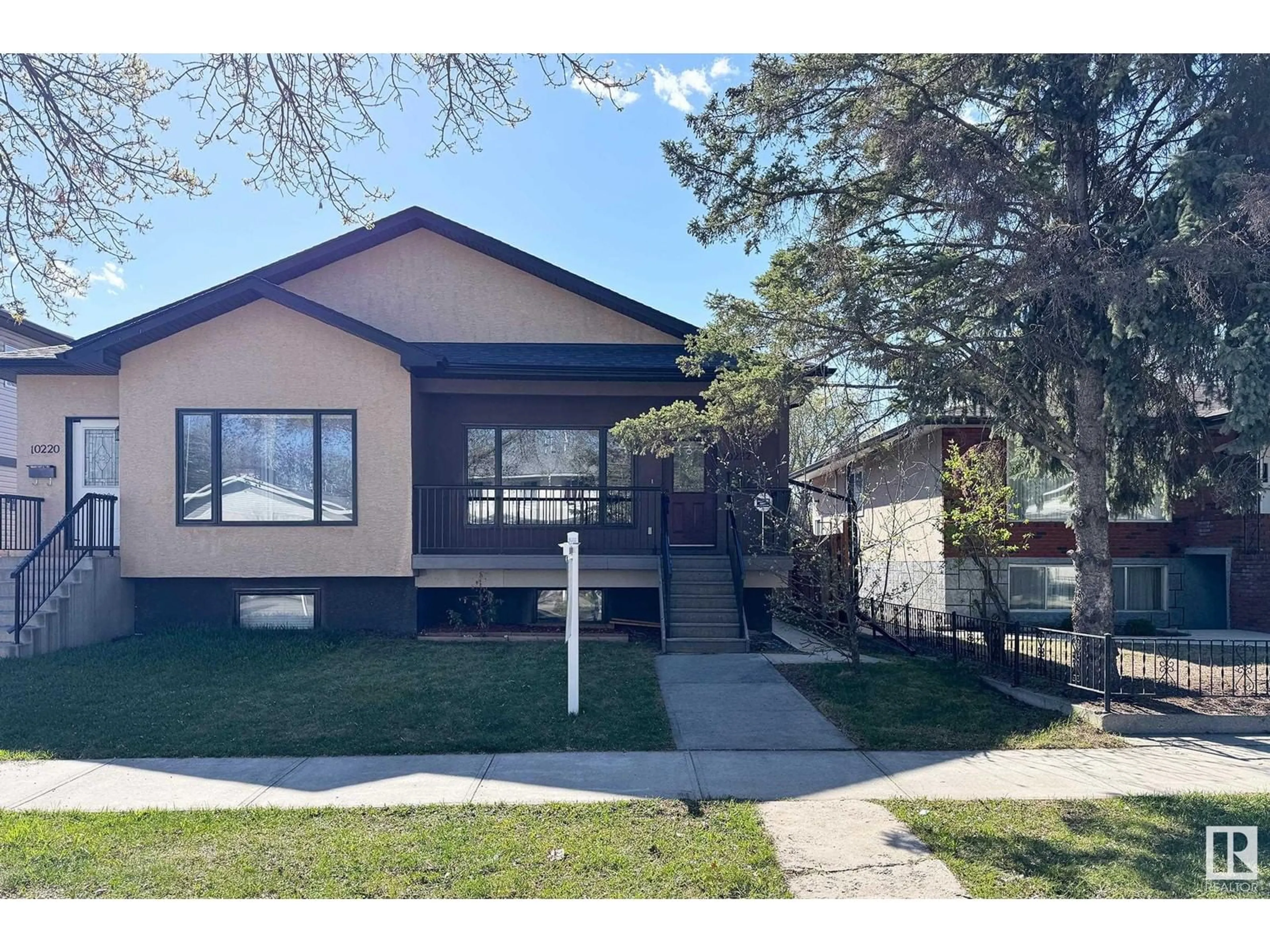 Home with vinyl exterior material, street for NW - 10222 150 ST, Edmonton Alberta T5P1P3