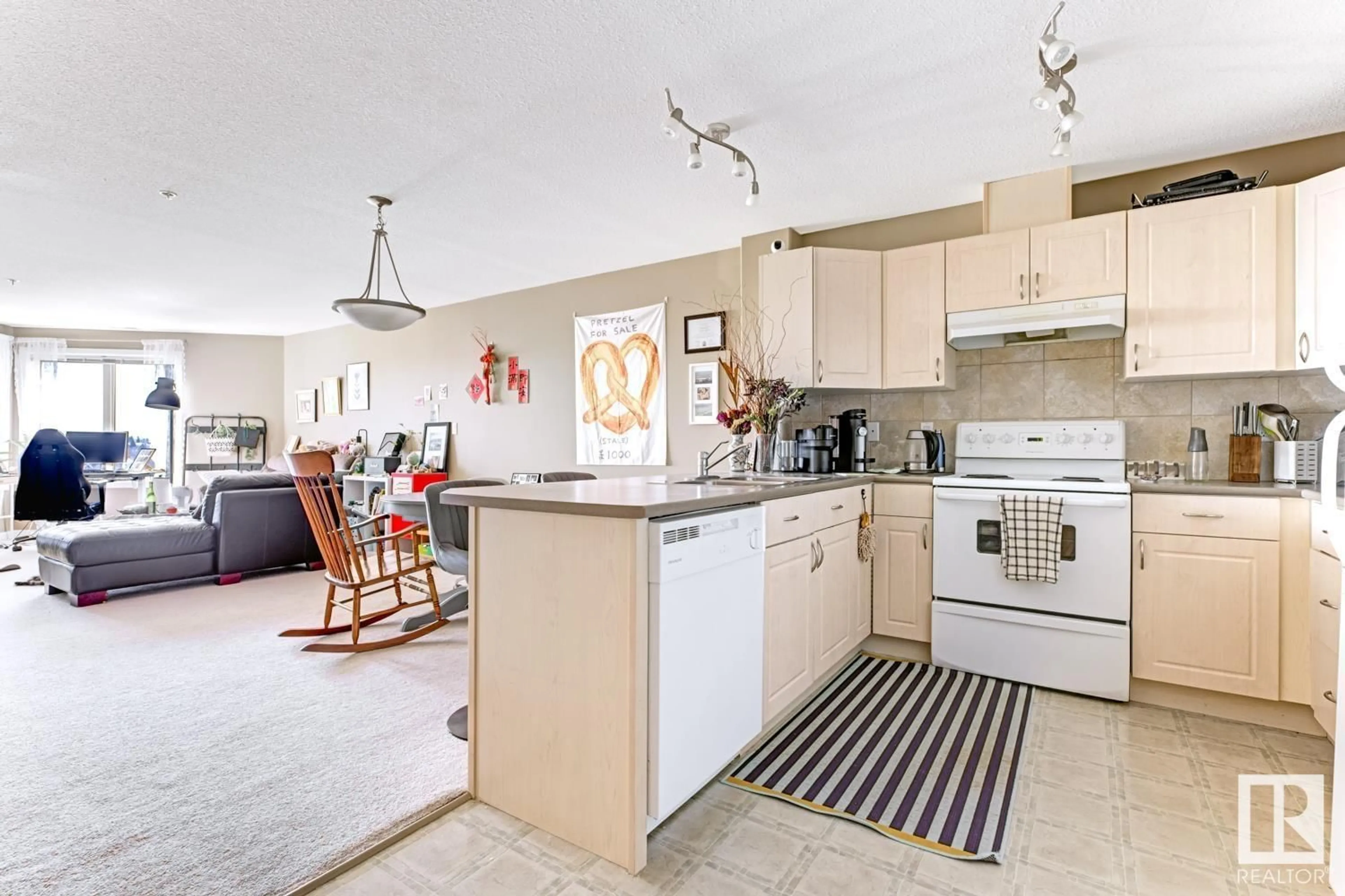 Open concept kitchen, ceramic/tile floor for 129 530 HOOKE RD NW, Edmonton Alberta T5A5J5