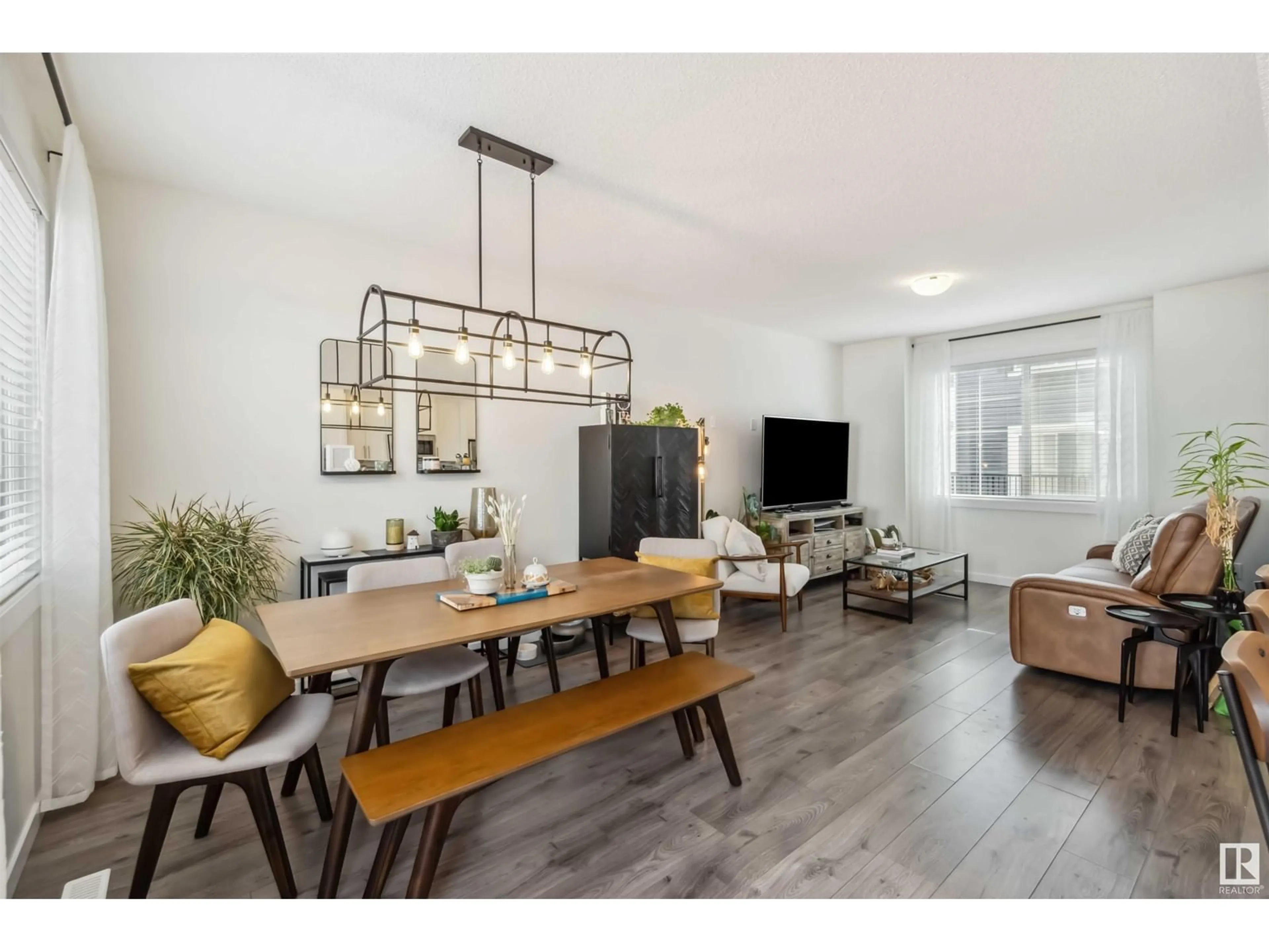 Living room with furniture, wood/laminate floor for 735 - 19 ALLARD BV, Edmonton Alberta T6W3W5