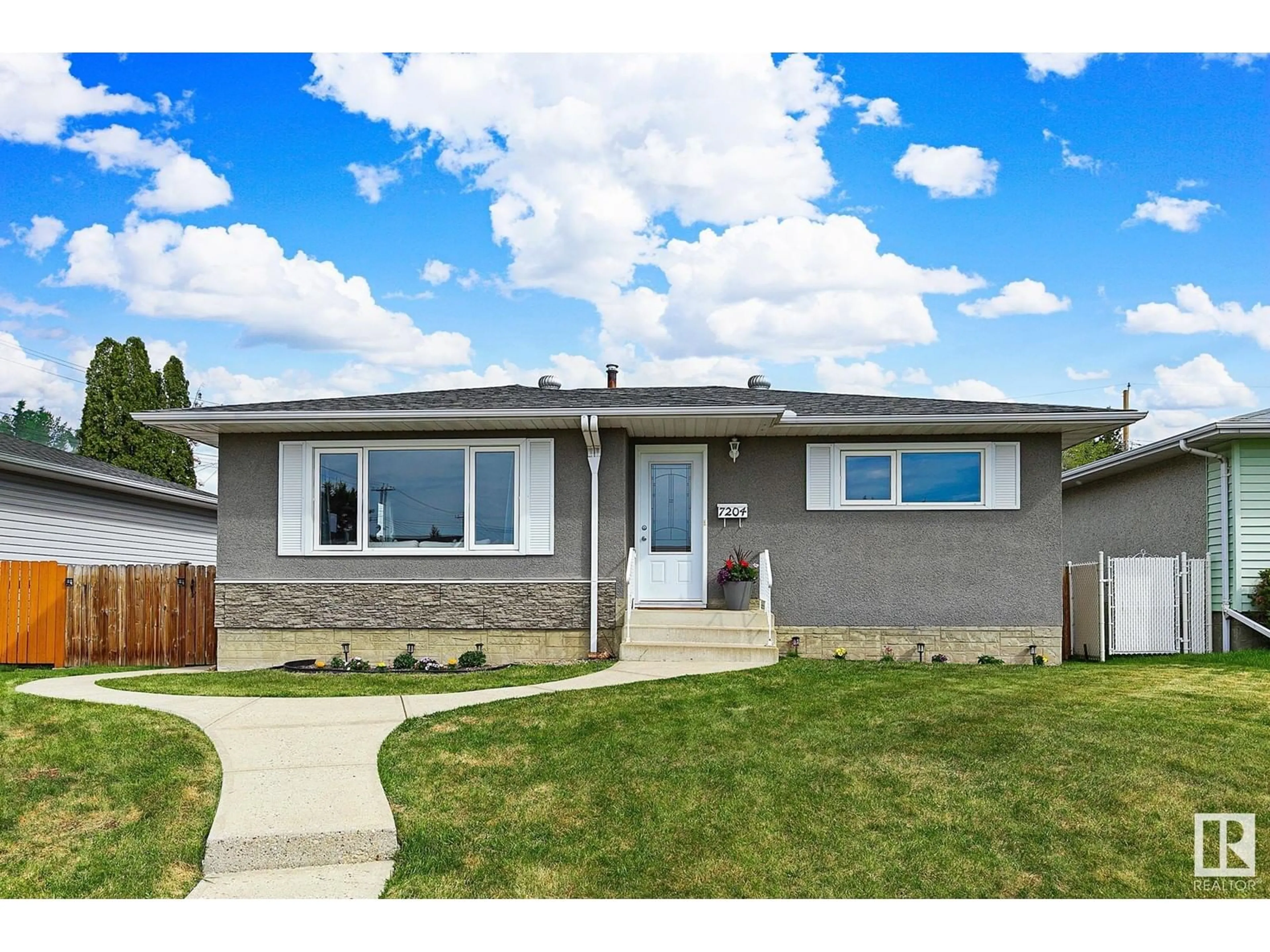 Home with vinyl exterior material, street for 7204 135A AV, Edmonton Alberta T5C2H9