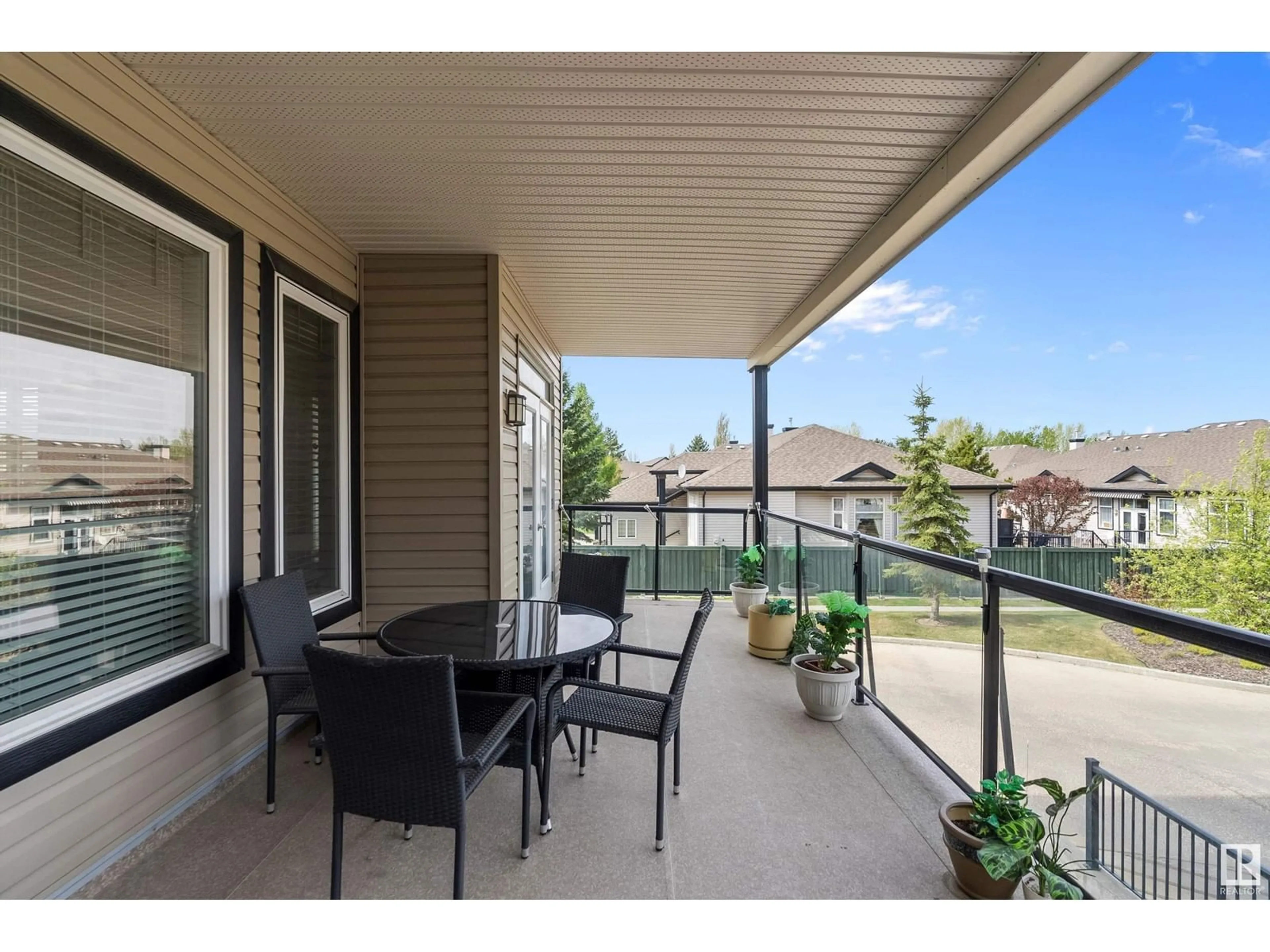 Patio, water/lake/river/ocean view for 205 - 12408 15 AV, Edmonton Alberta T6W1X2
