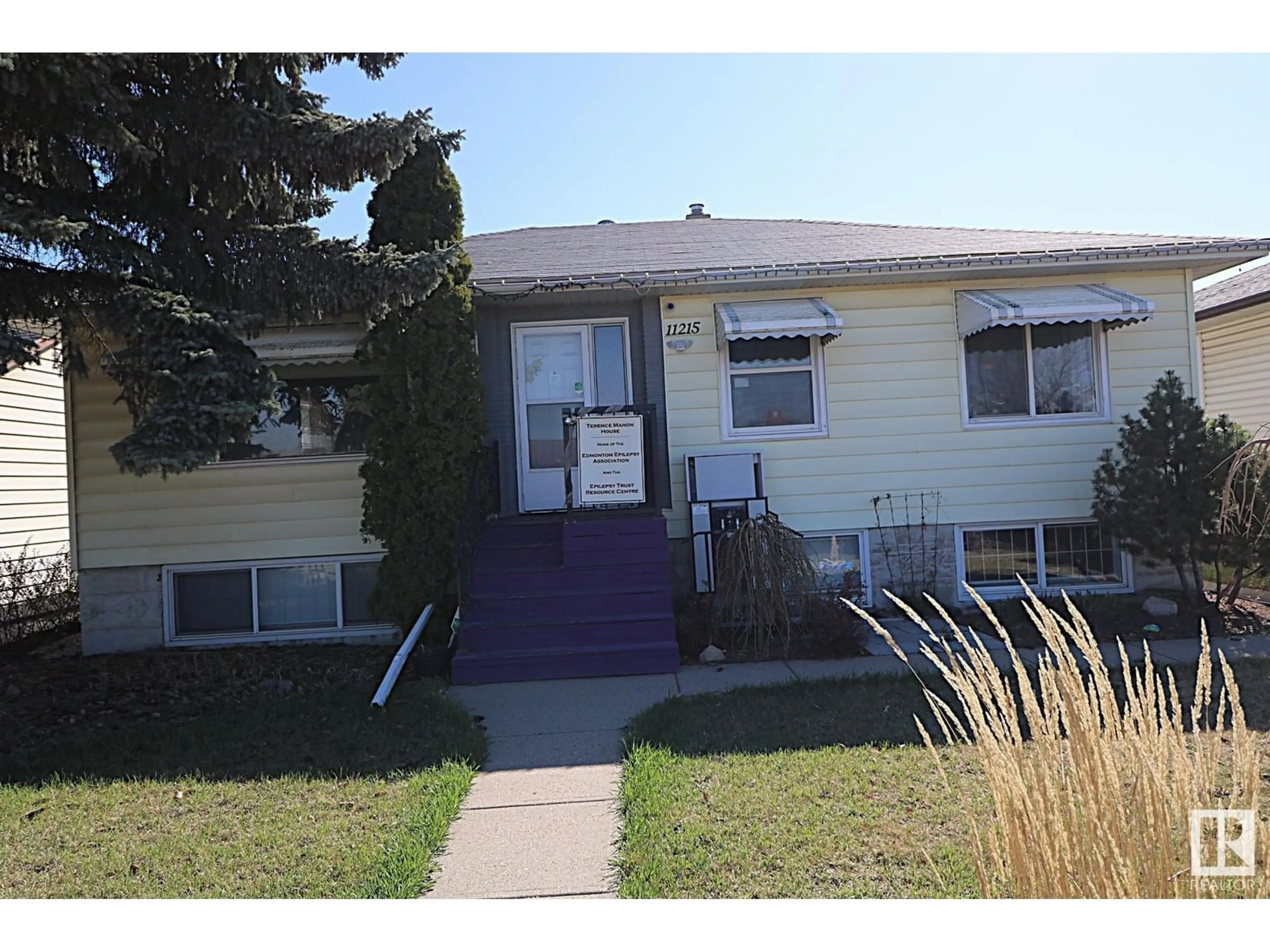 Home with vinyl exterior material, street for 11215 GROAT RD, Edmonton Alberta T5M3K2